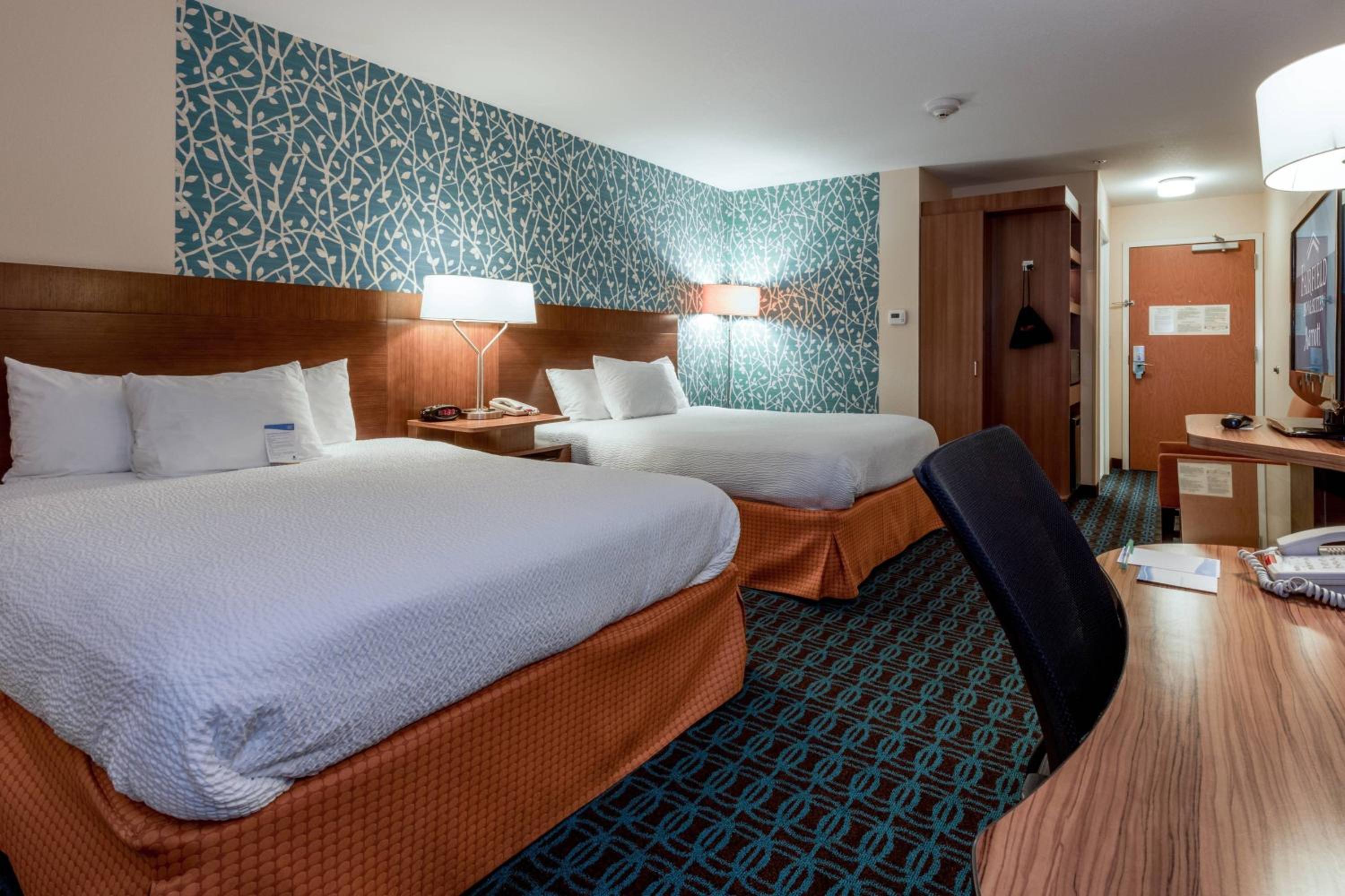 Queen Room with Two Queen Beds - Hearing Accessible photo 1