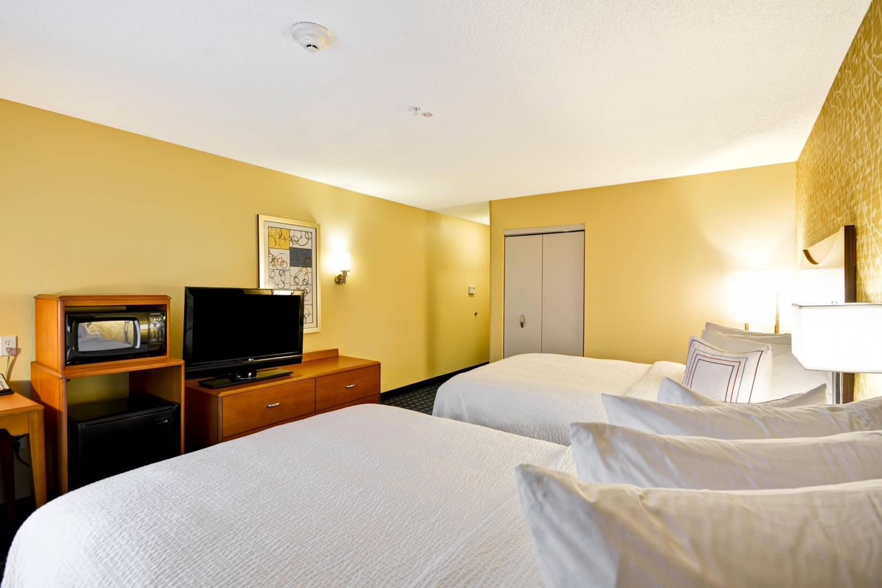 Double Room with Two Double Beds and Adapted Tub - Mobility and Hearing Accessible photo 1