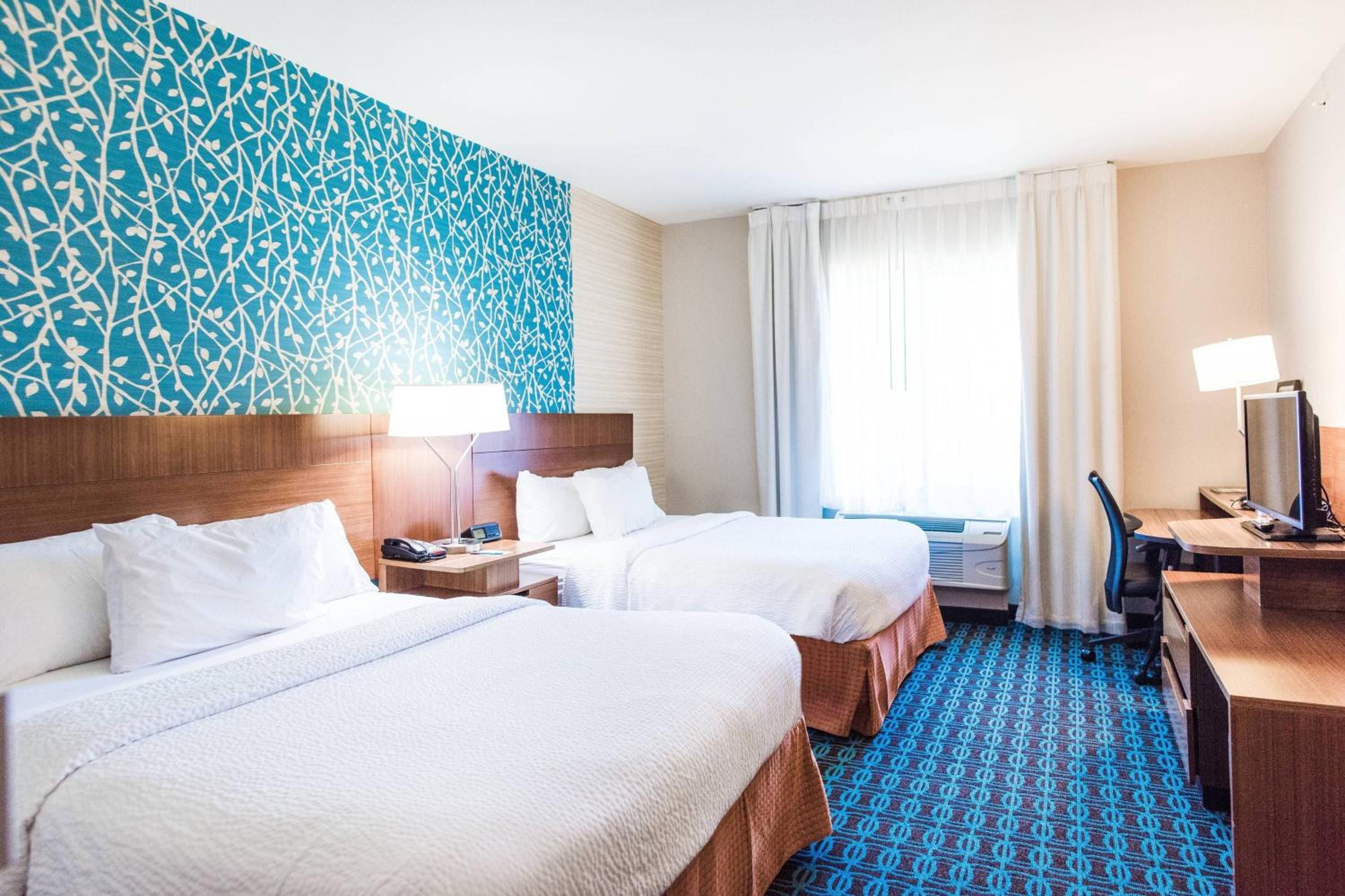 Queen Room with Two Queen Beds - Hearing Accessible photo 1