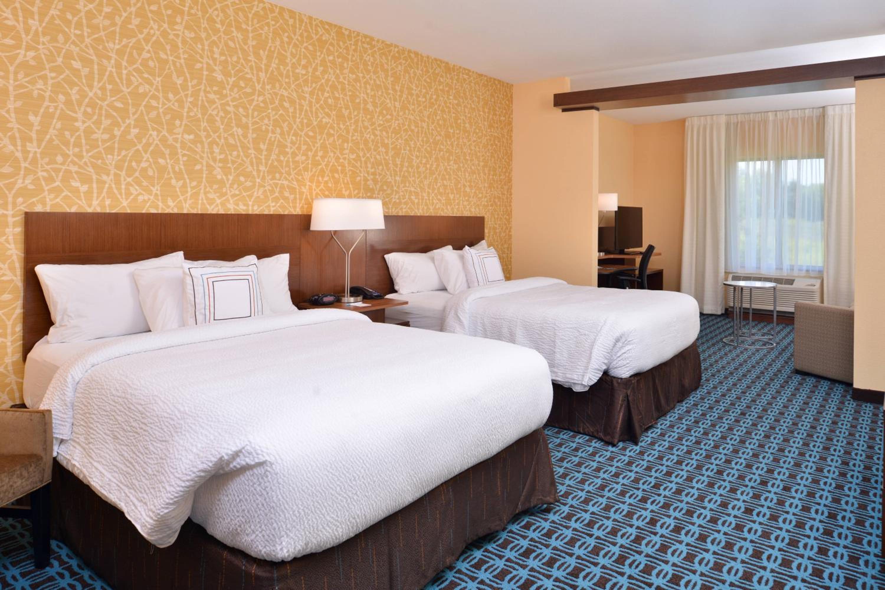 Queen Suite with Two Queen Beds and Sofa Bed