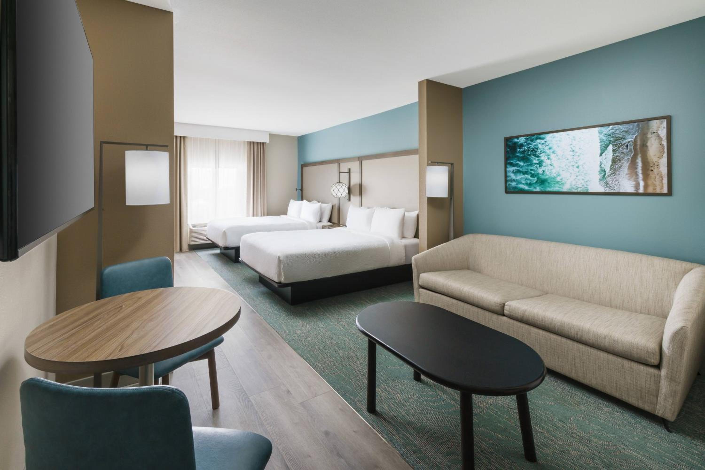 Queen Suite with Two Queen Beds and Sofa Bed