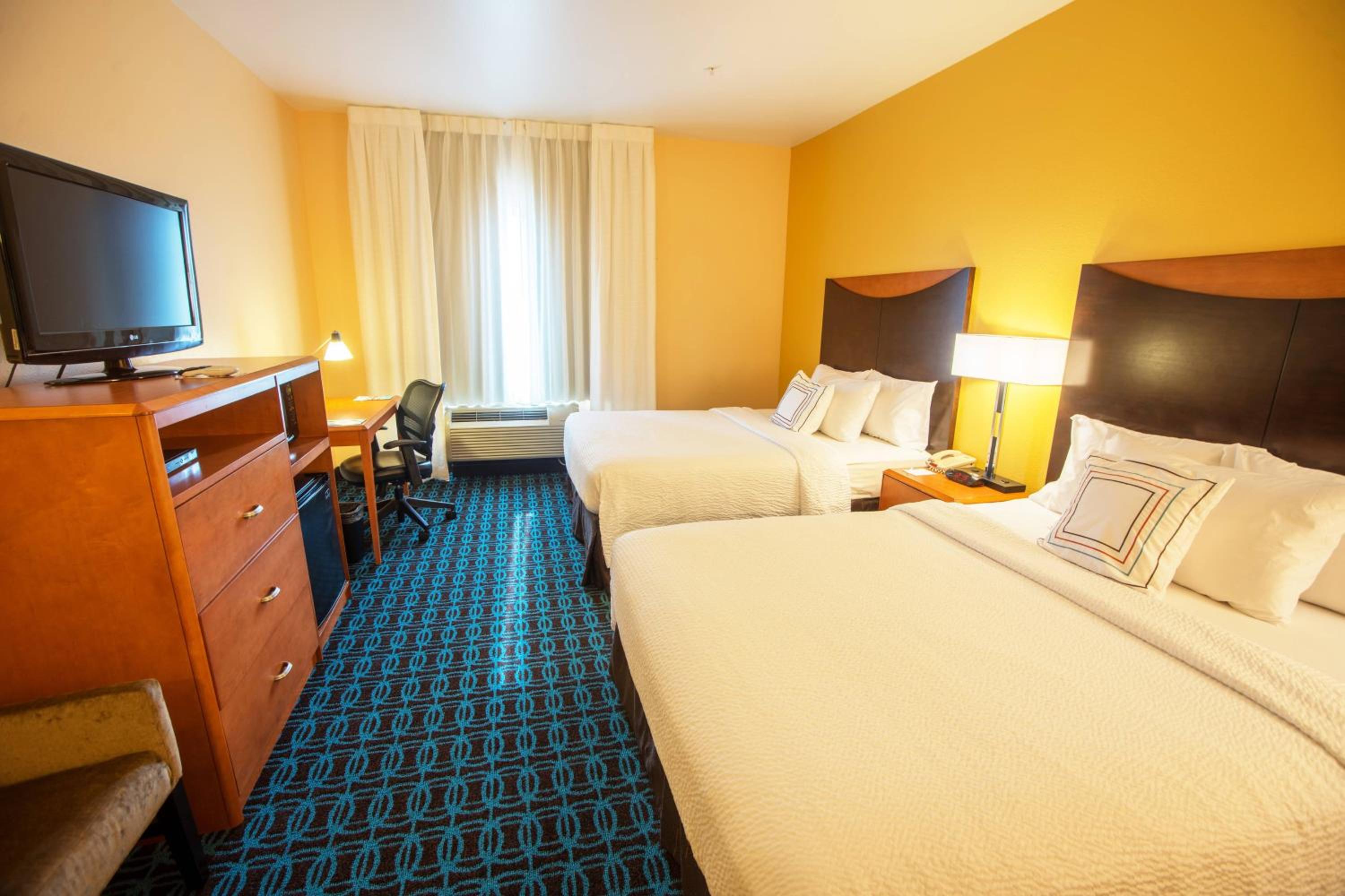 Queen Room with Two Queen Beds - Hearing Accessible - Photo 1