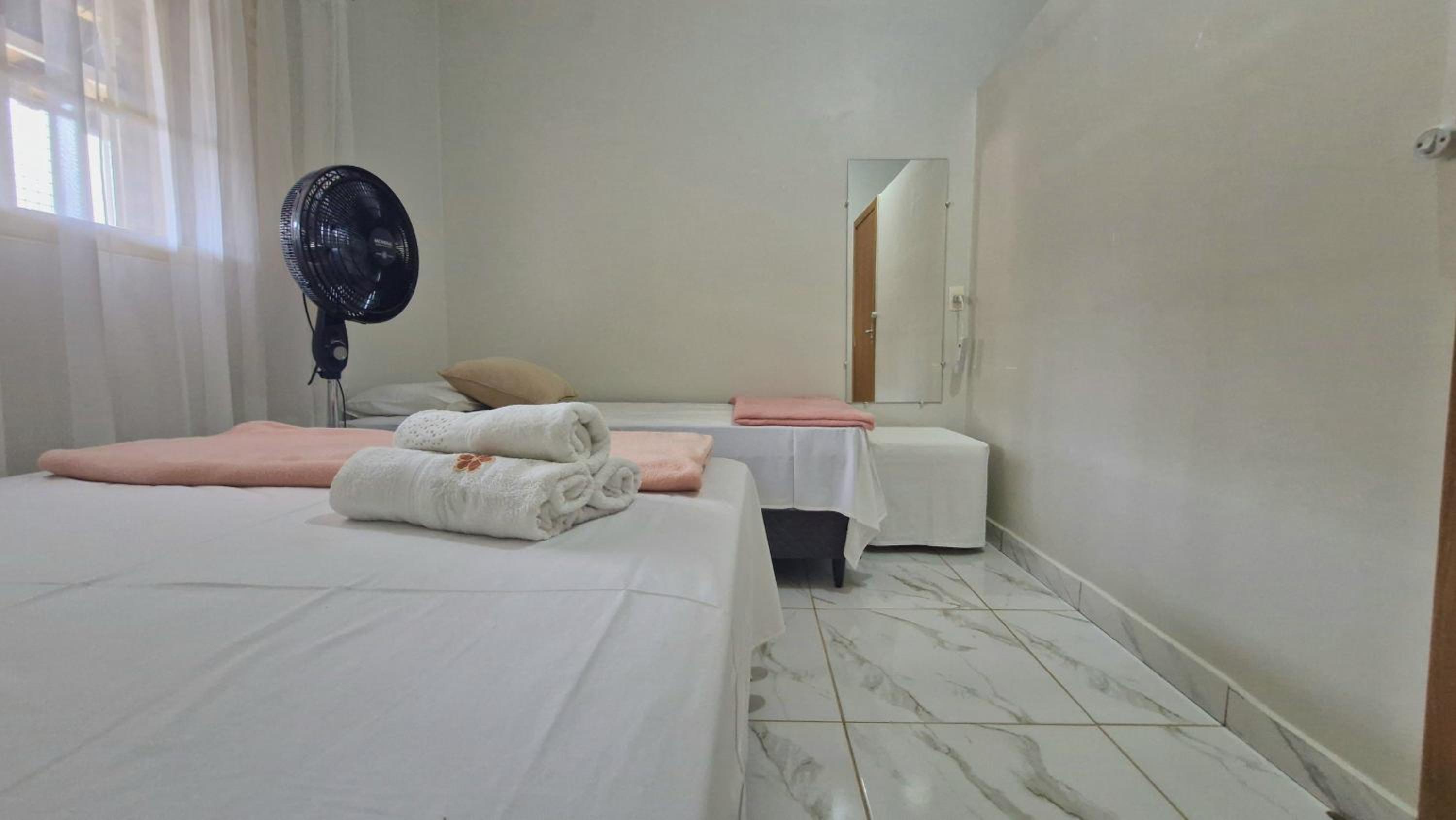Basic Triple Room with Shared Bathroom photo 2