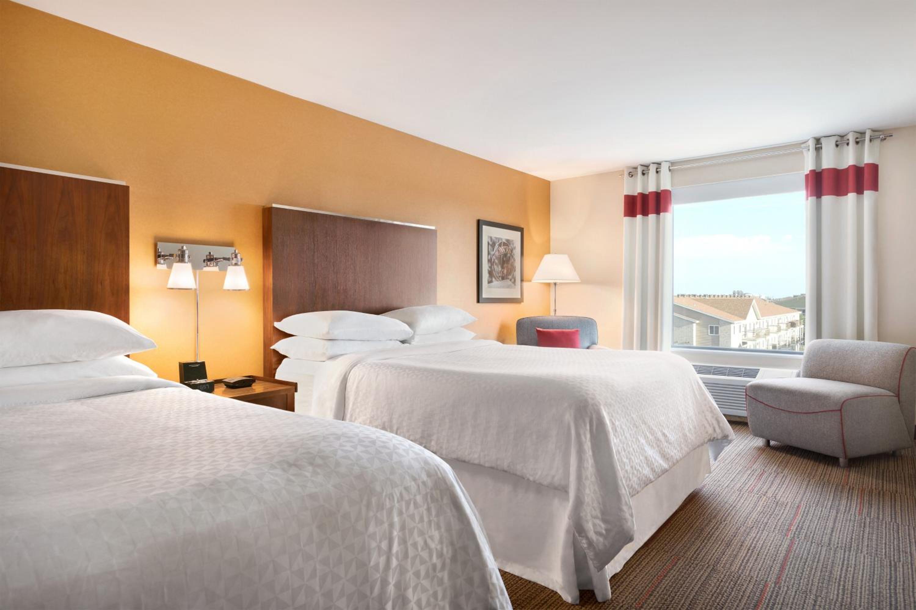 Queen Room with Two Queen Beds and Adapted Tub - Mobility and Hearing Accessible photo 1
