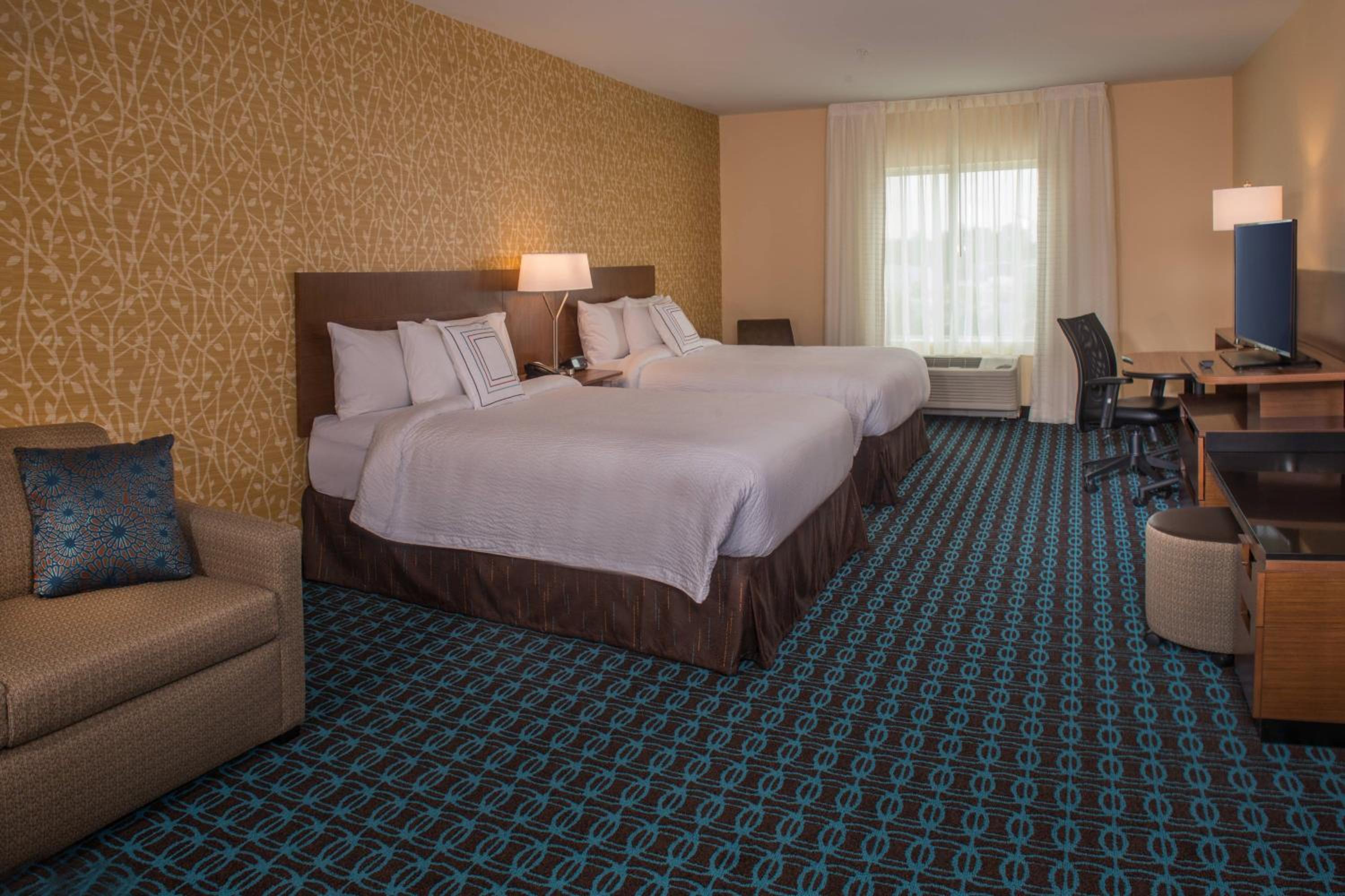 Queen Suite with Two Queen Beds and Sofa Bed