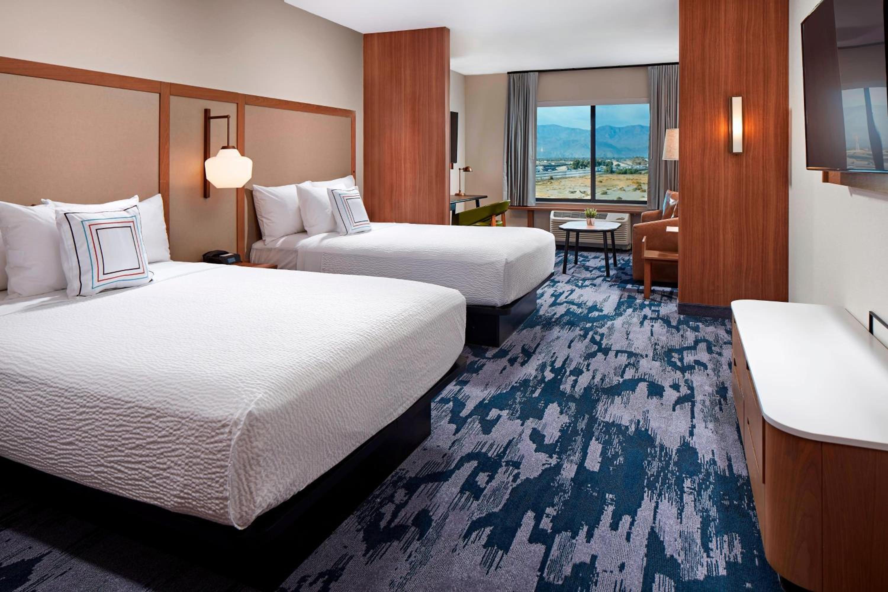 Queen Suite with Two Queen Beds and Sofa Bed
