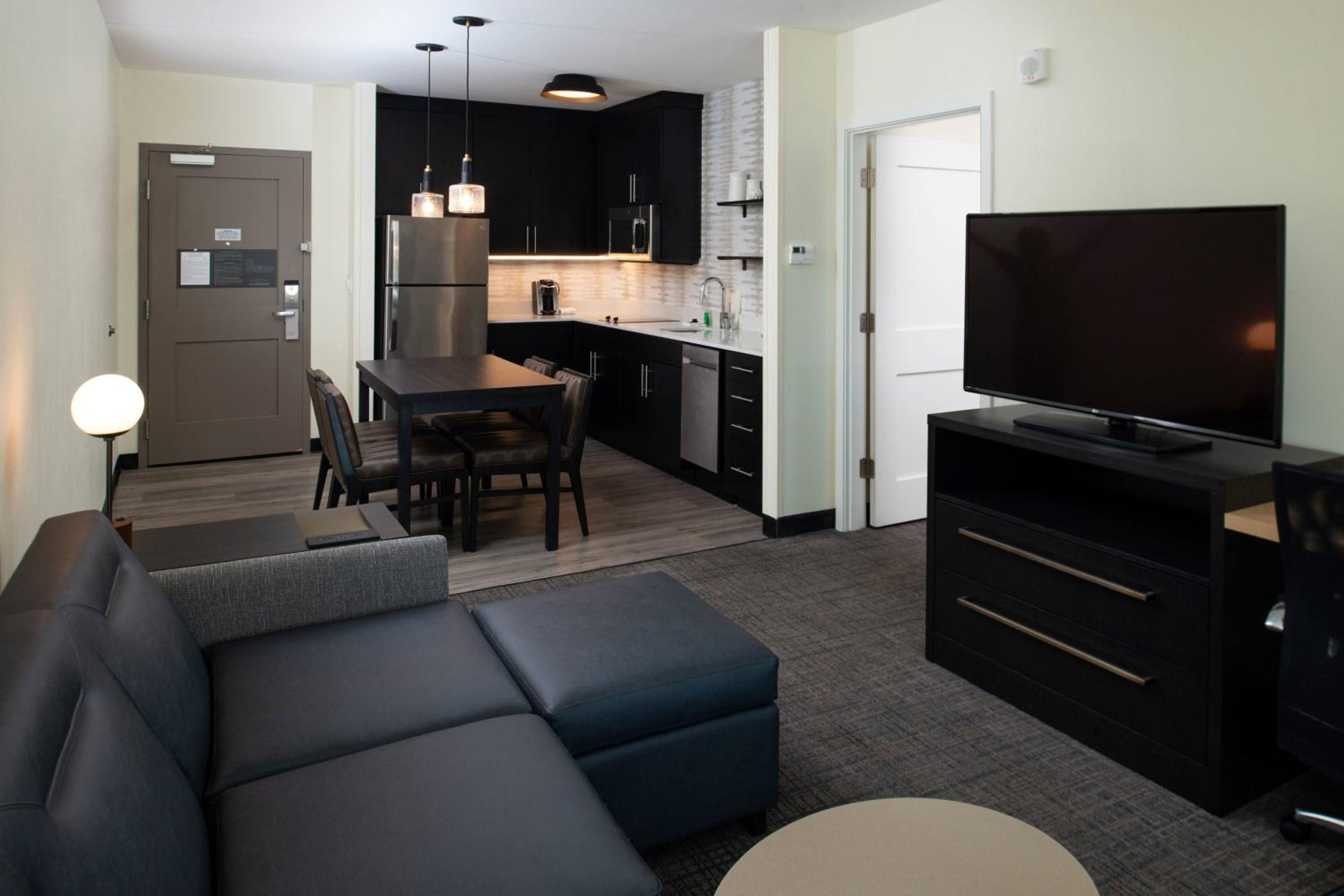 One-Bedroom Suite with Two Queen Beds with Sofa Bed and Roll-In Shower - Mobility Accessible