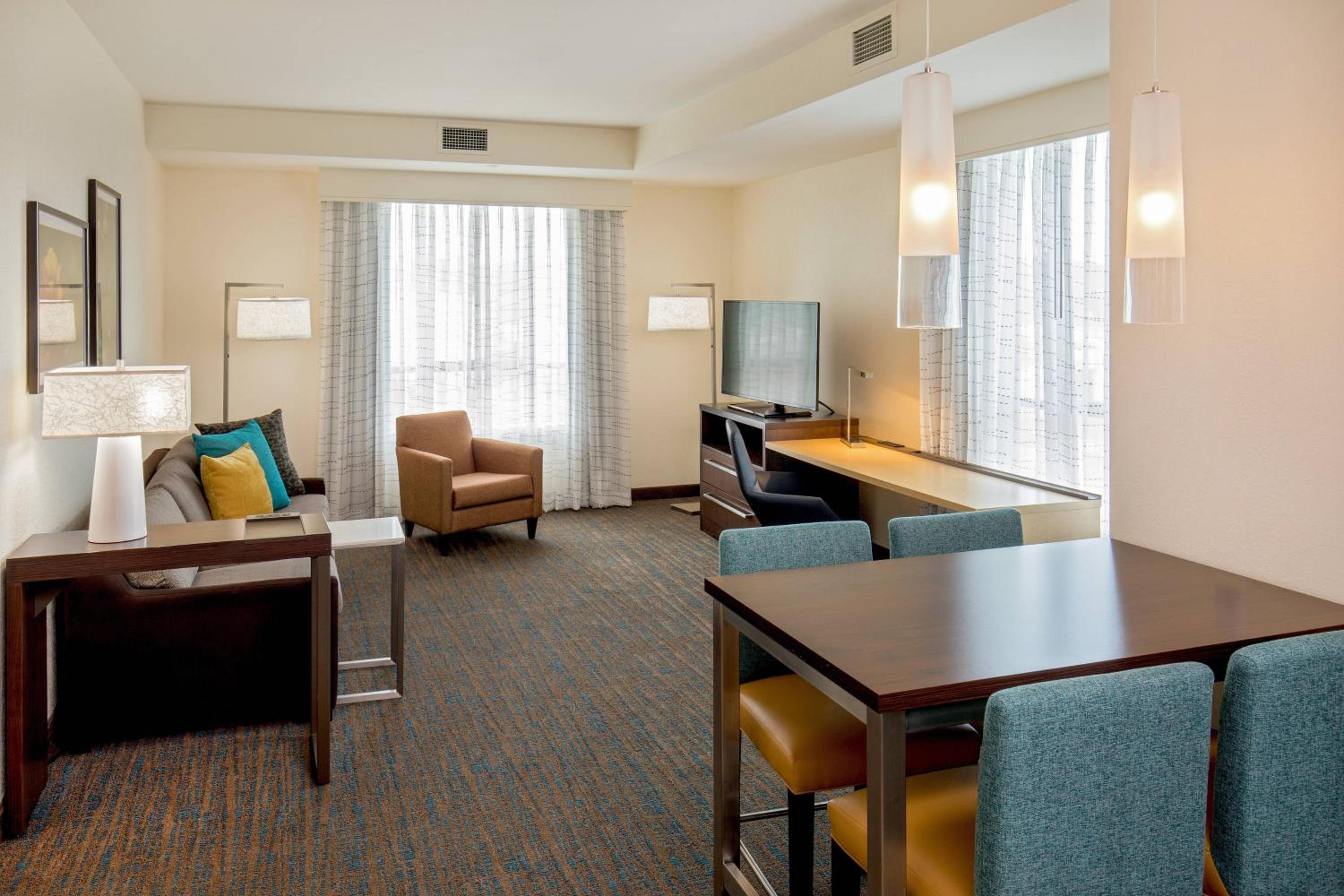 One-Bedroom King Suite with Sofa Bed and Roll-in Shower - Mobility and Hearing Accessible