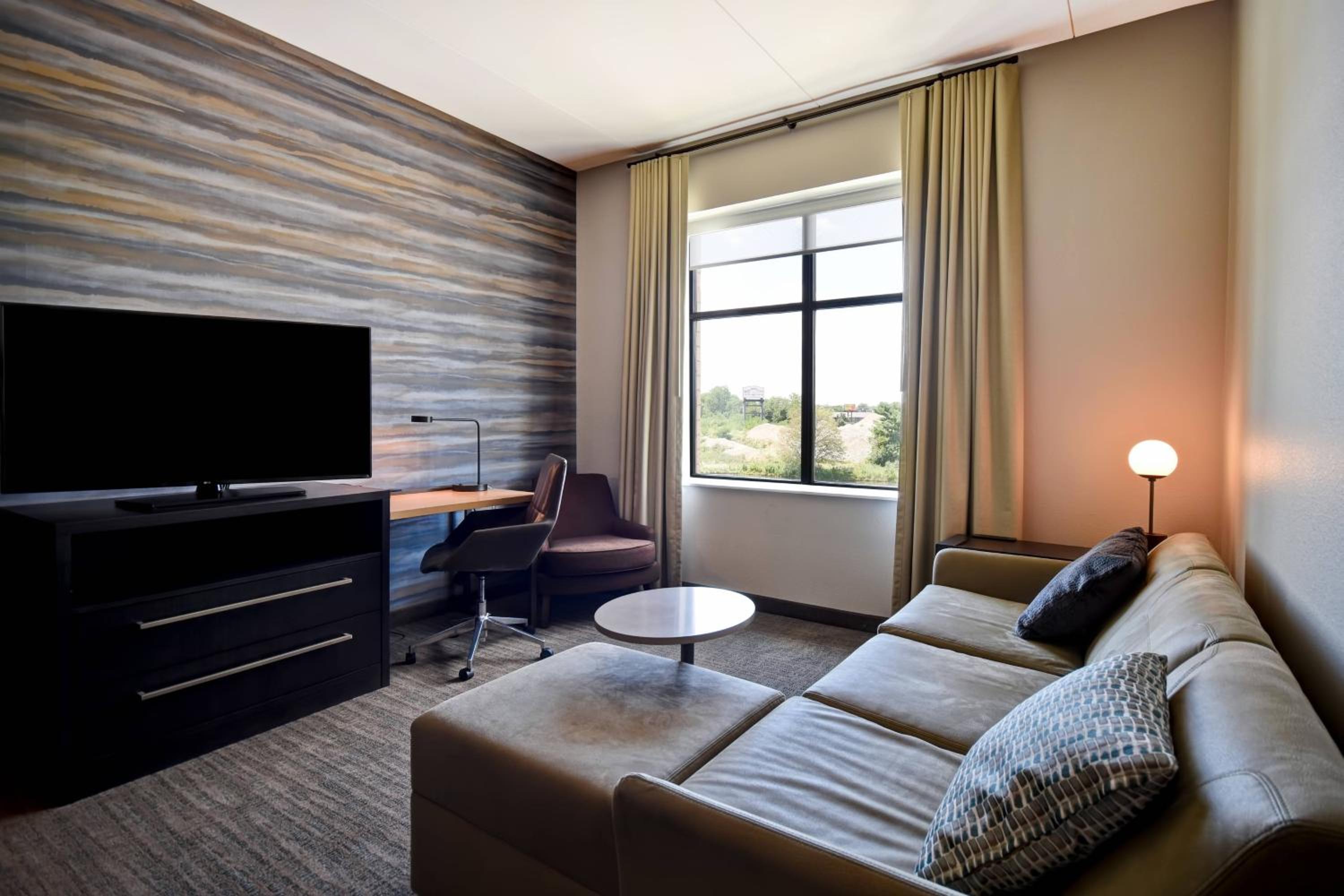 One-Bedroom Queen Suite with Sofa Bed - Hearing Accessible photo 1