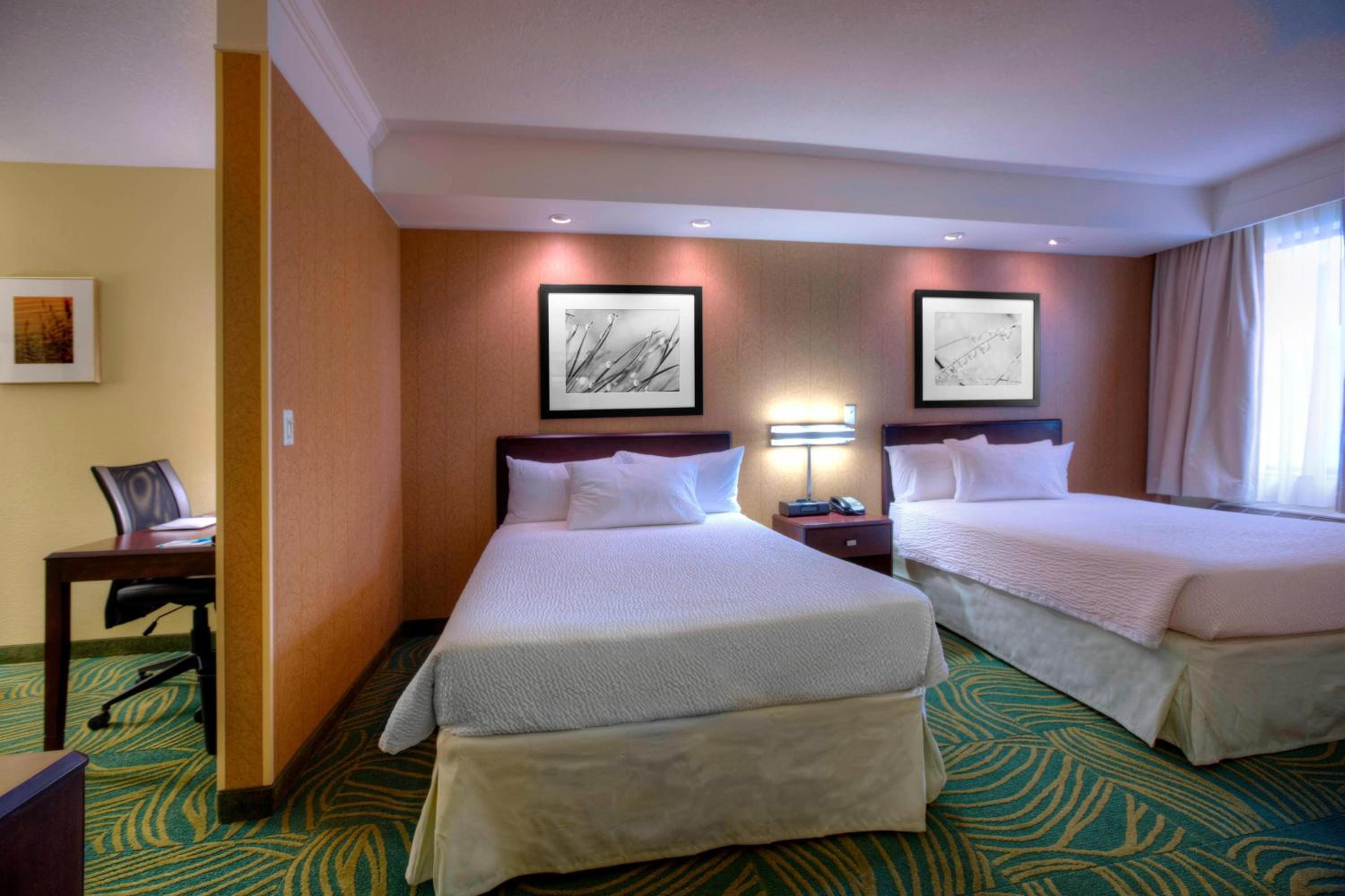 Queen Suite with Two Queen Beds and Trundle Sofa - Photo 1