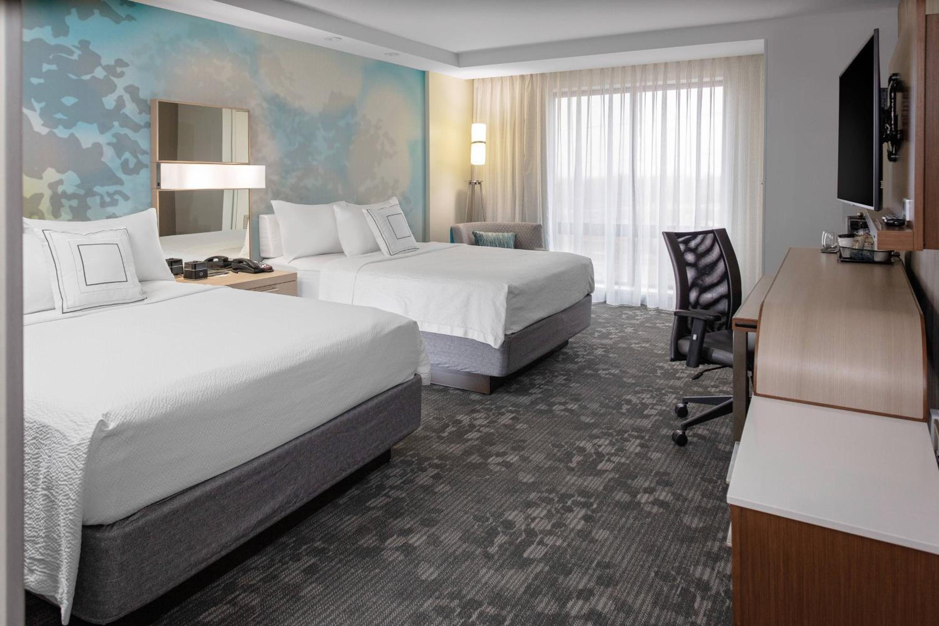 Queen Room with Two Queen Beds - Hearing Accessible - Photo 1