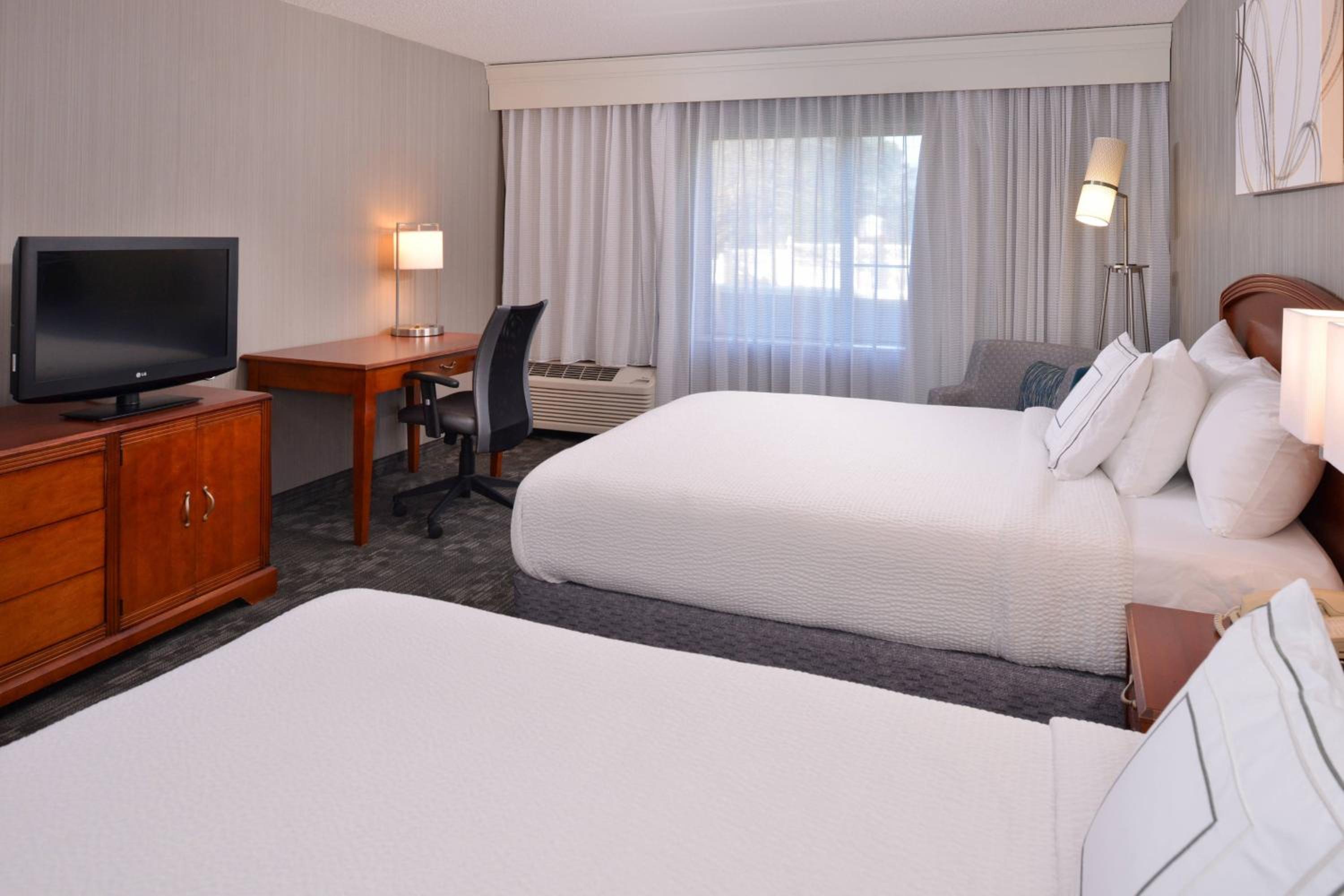 Queen Room with Two Queen Beds - Photo 1