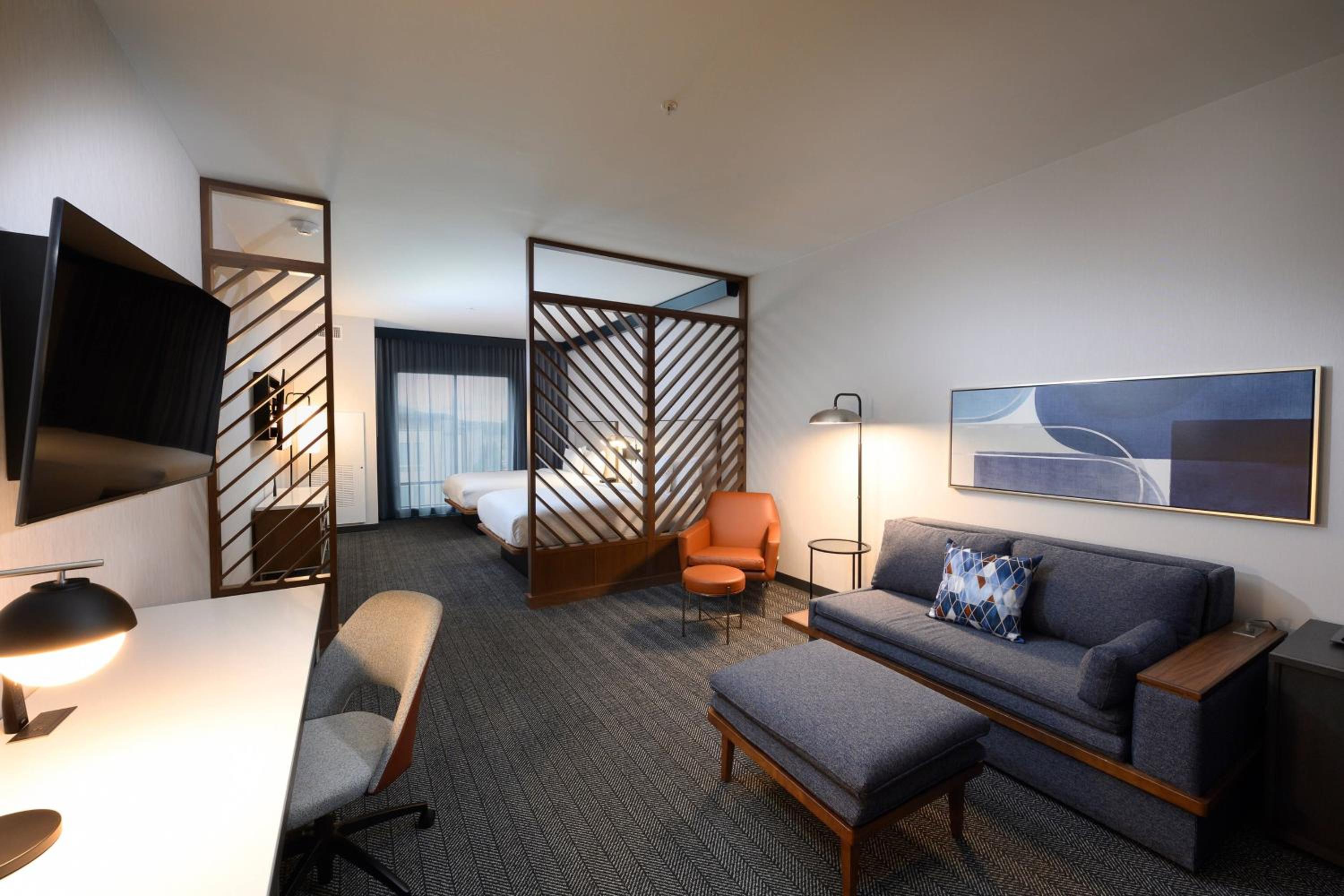 Queen Suite with Two Queen Beds and Sofa Bed - Photo 1