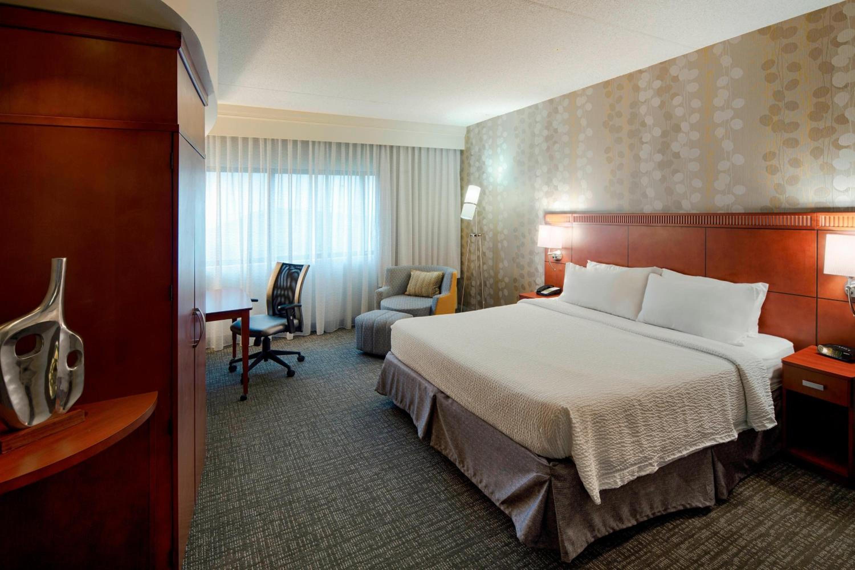 King Room with Sofa Bed and Roll-in Shower - Mobility and Hearing Accessible