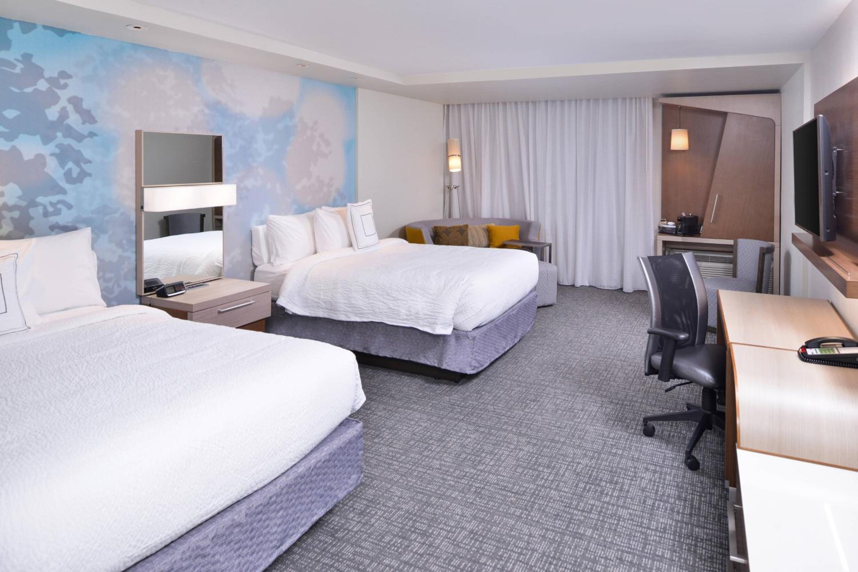 Queen Room with Two Queen Beds and Sofa Bed - Hearing Accessible photo 2