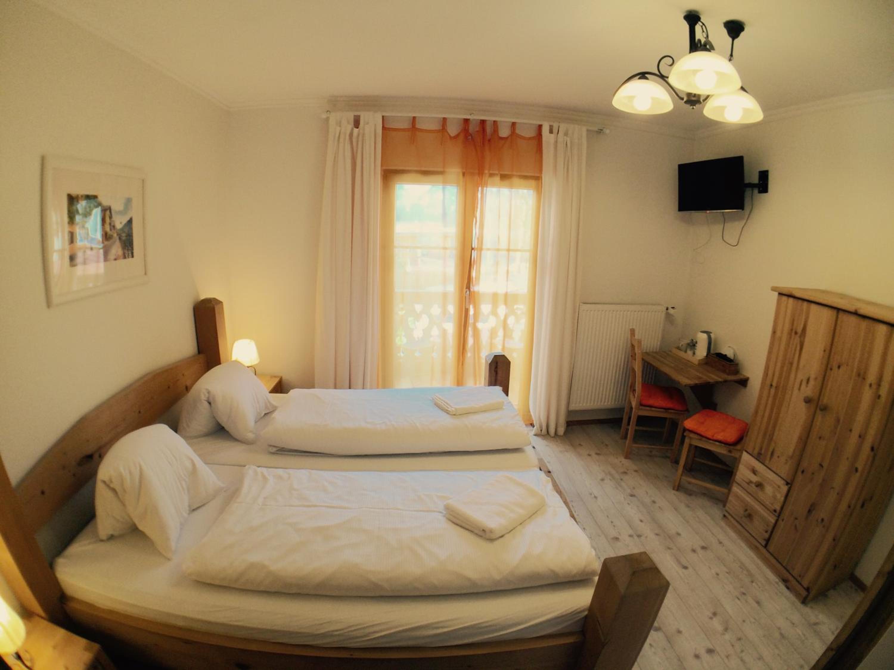 Small Double Room with Mountain and partial Lake View - First Floor photo 1