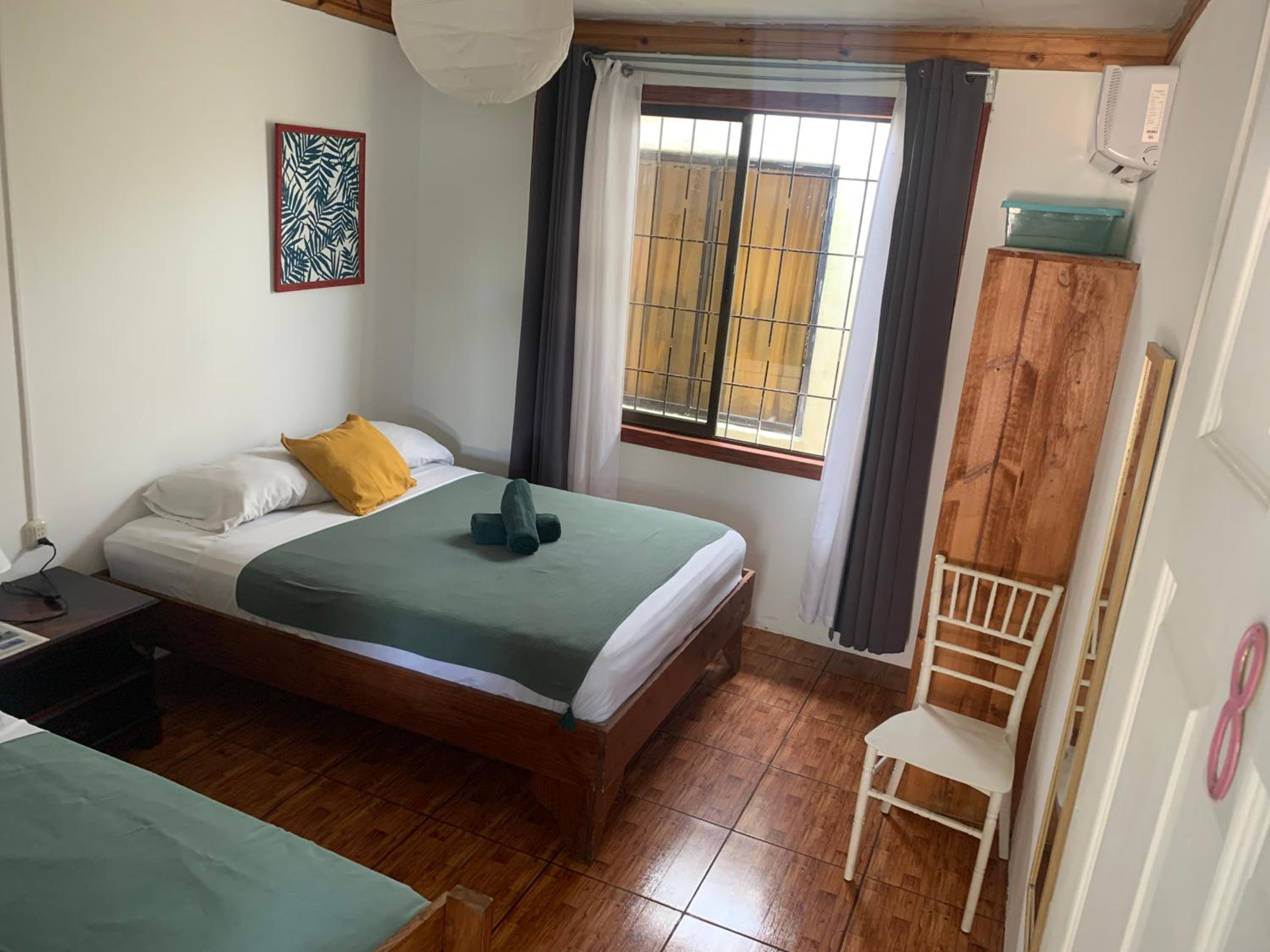 Basic Triple Room with Shared Bathroom photo 2