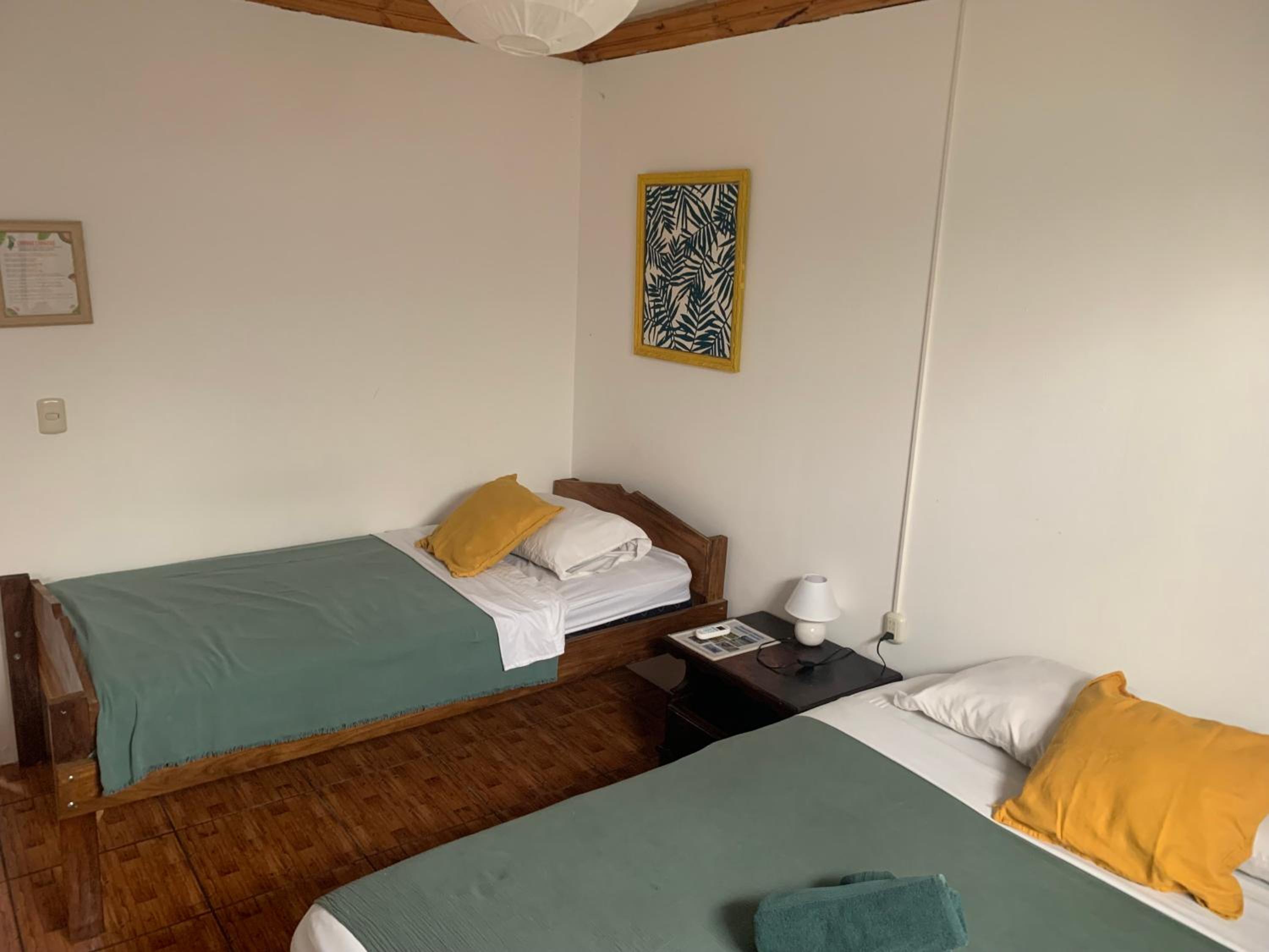 Basic Triple Room with Shared Bathroom