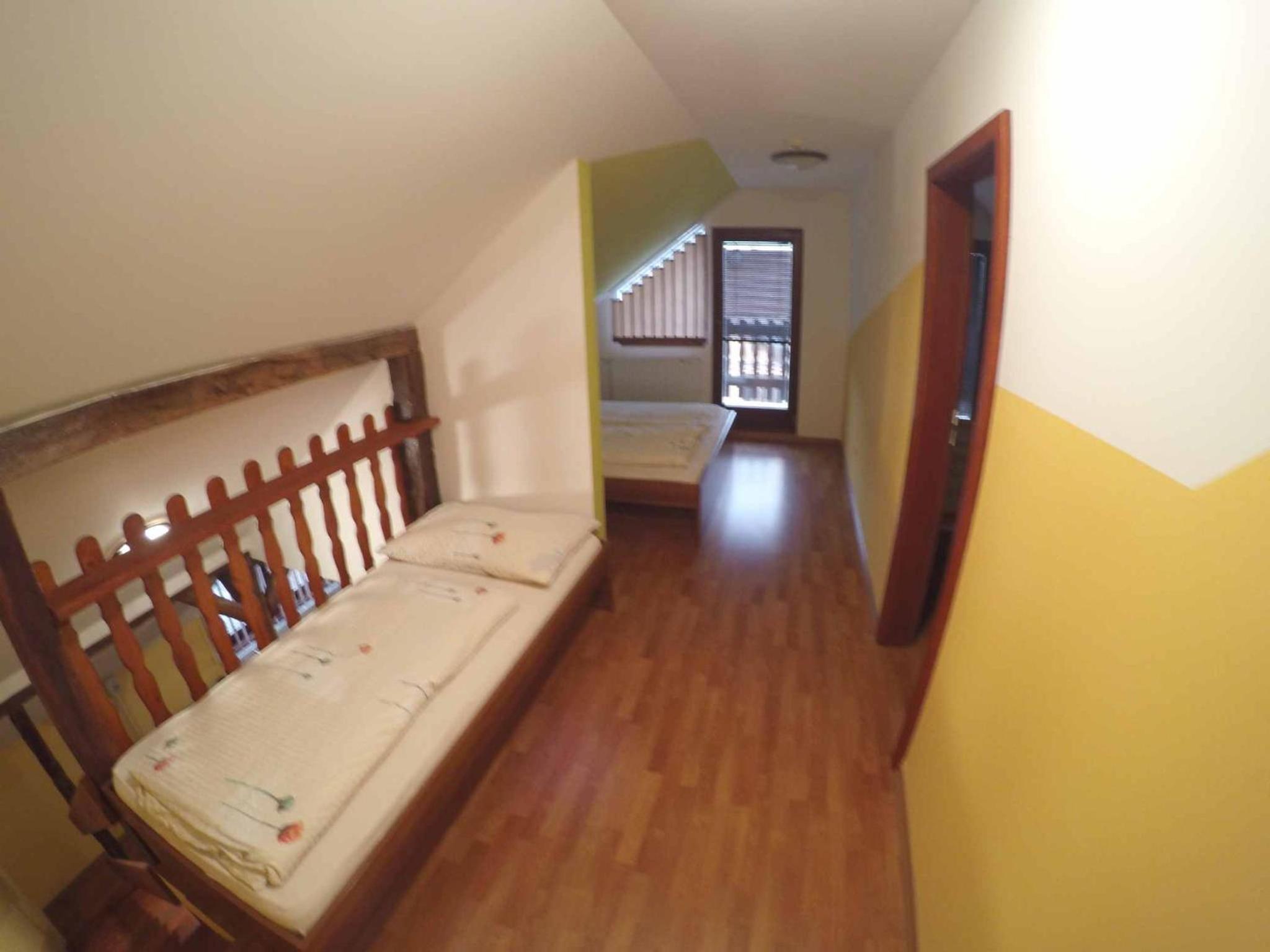 Family Room with Balcony - Photo 9