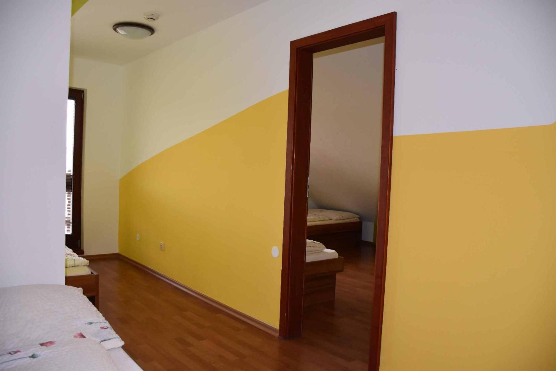 Family Room with Balcony - Photo 4