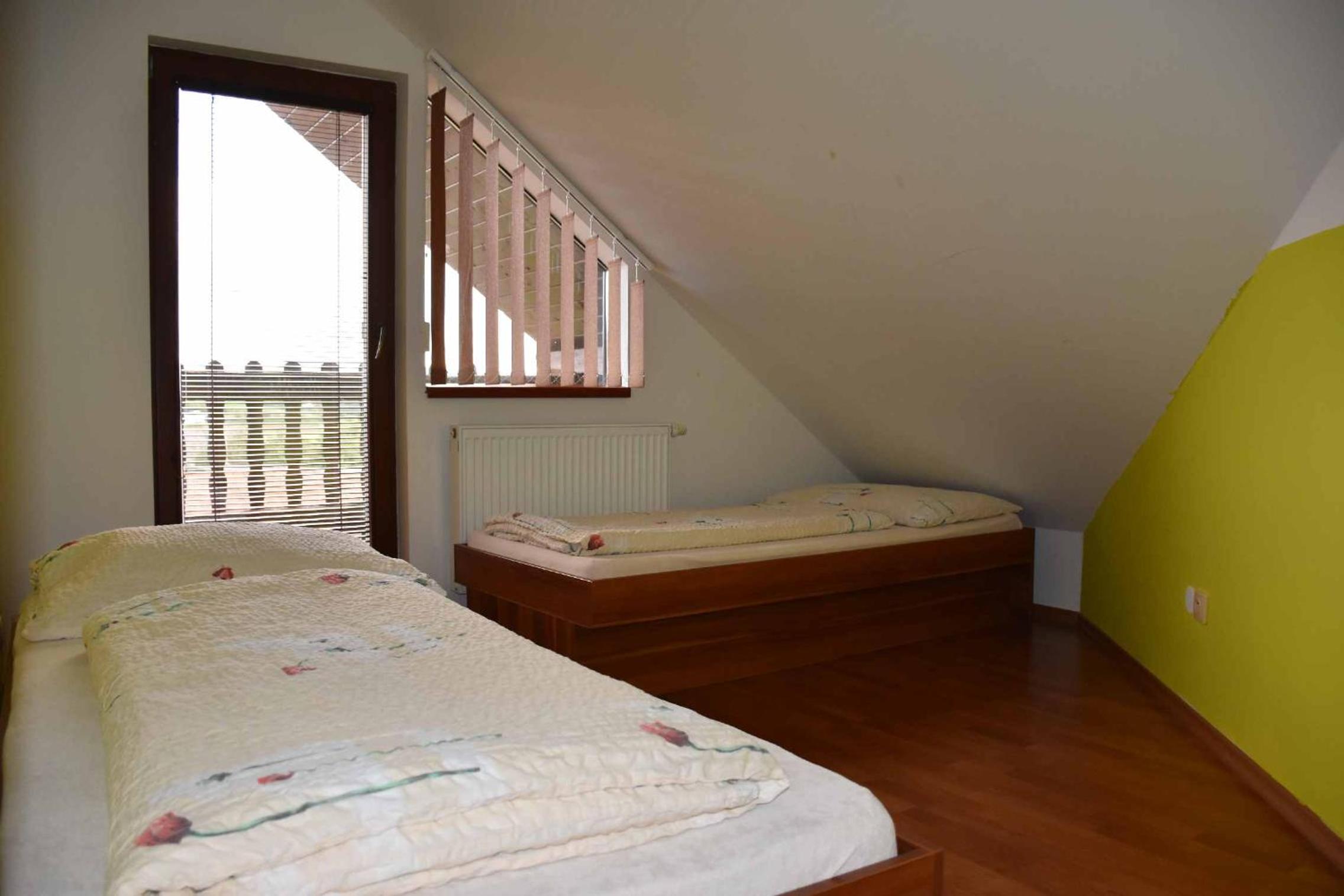 Family Room with Balcony - Photo 3