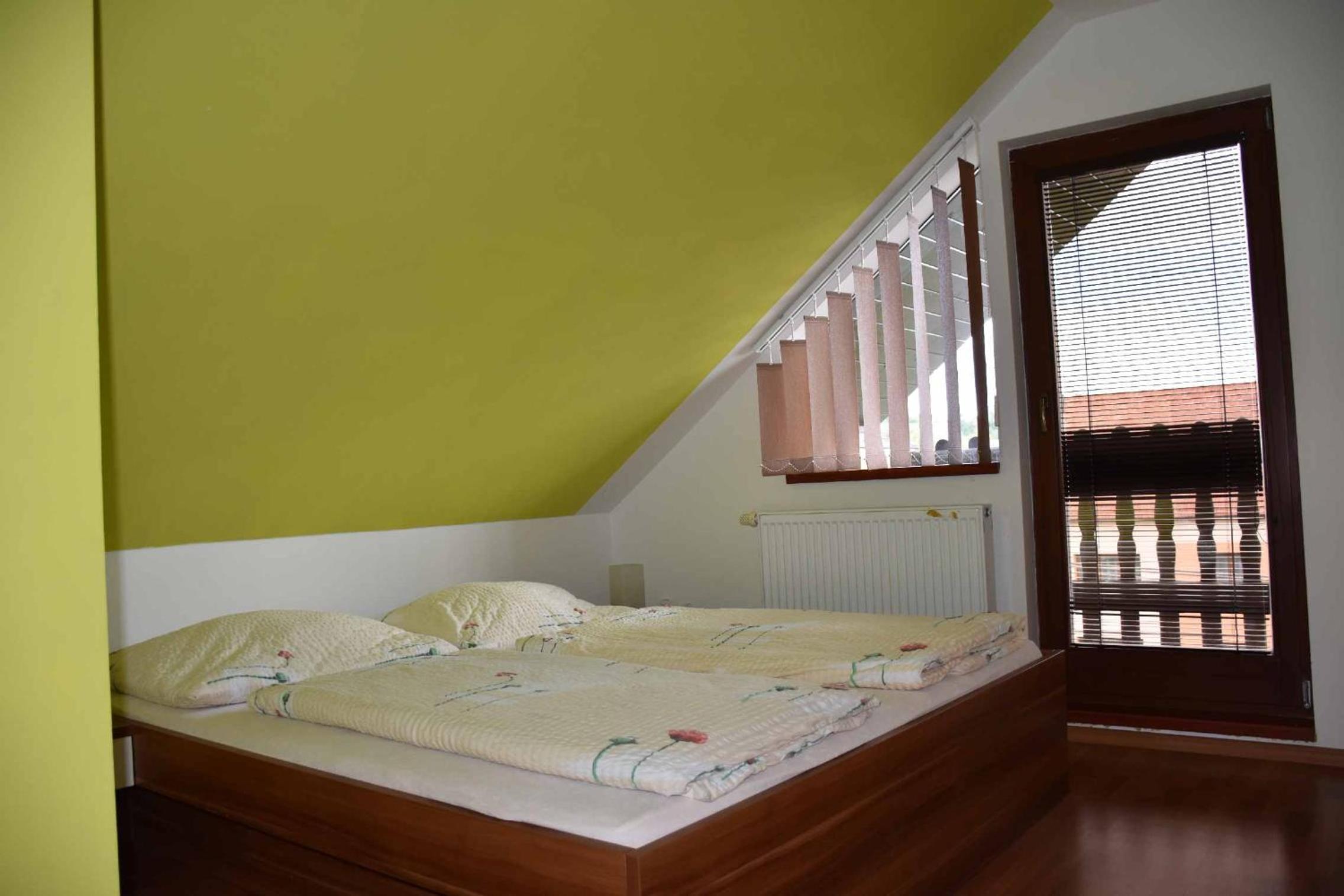 Family Room with Balcony - Photo 2