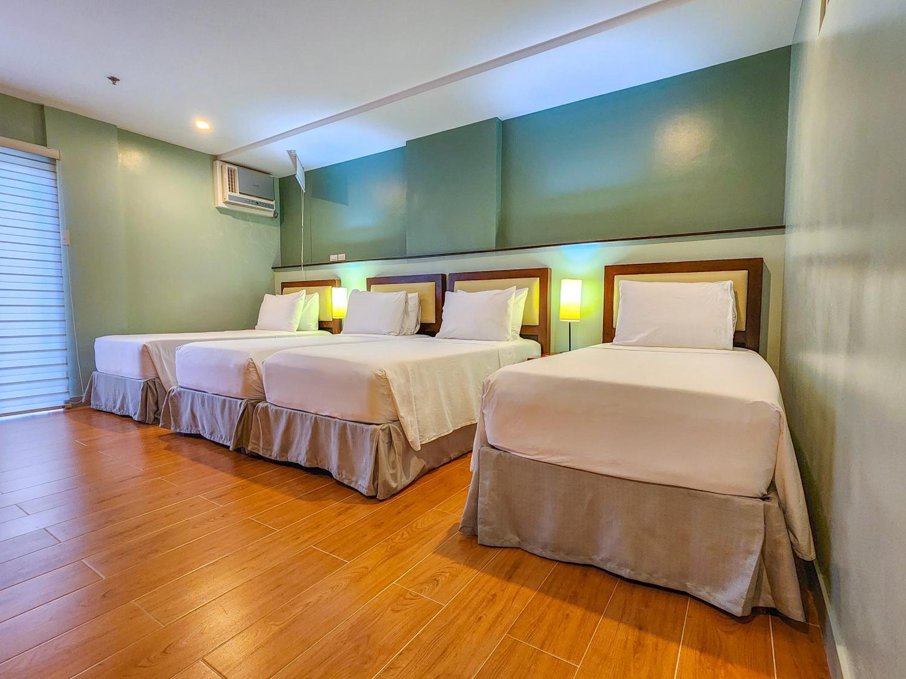 Standard Quadruple Room - Photo 1