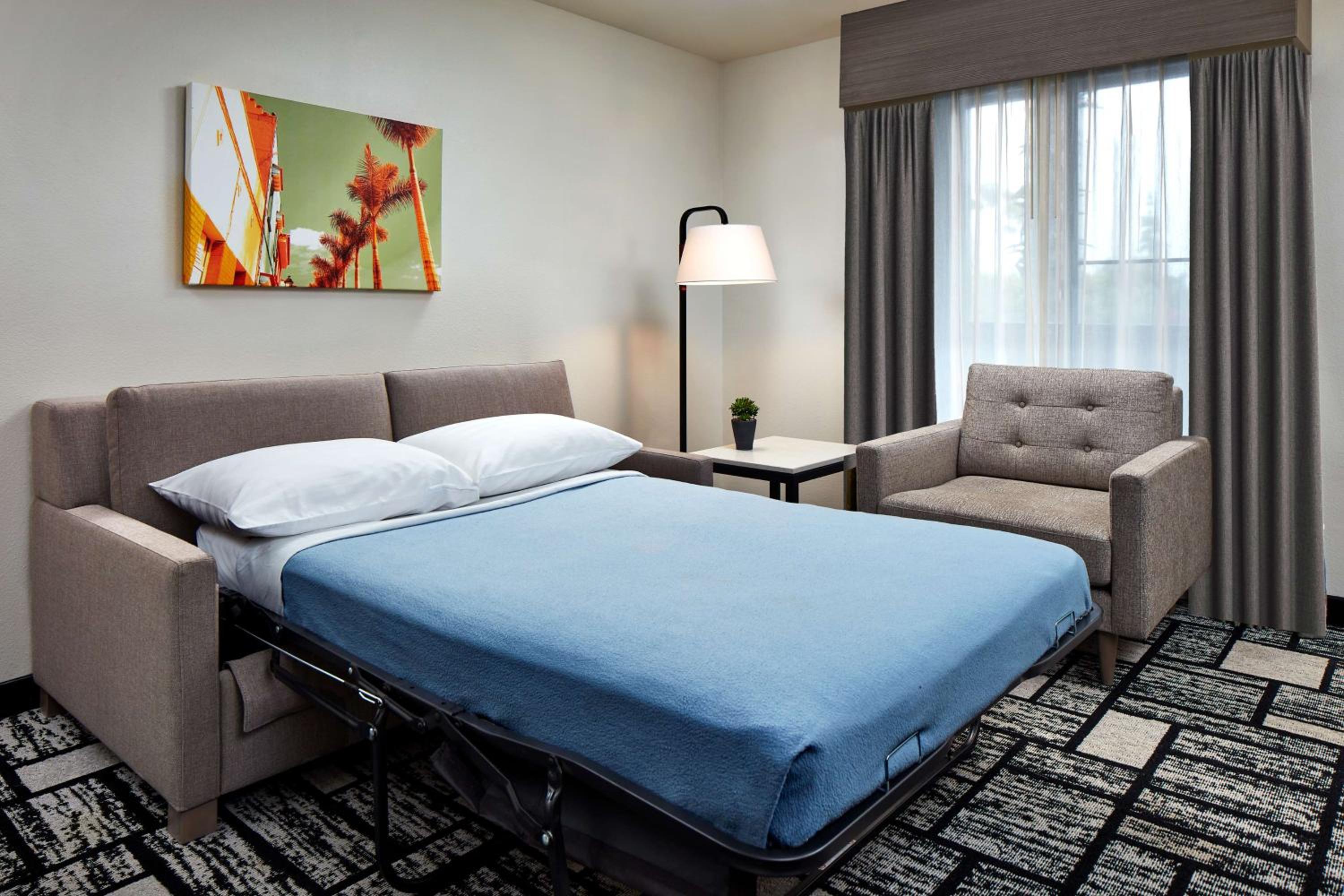Two-Room King Suite with Bath Tub, Sofa Bed and Wet Bar - Disability/Non-Smoking - Photo 1