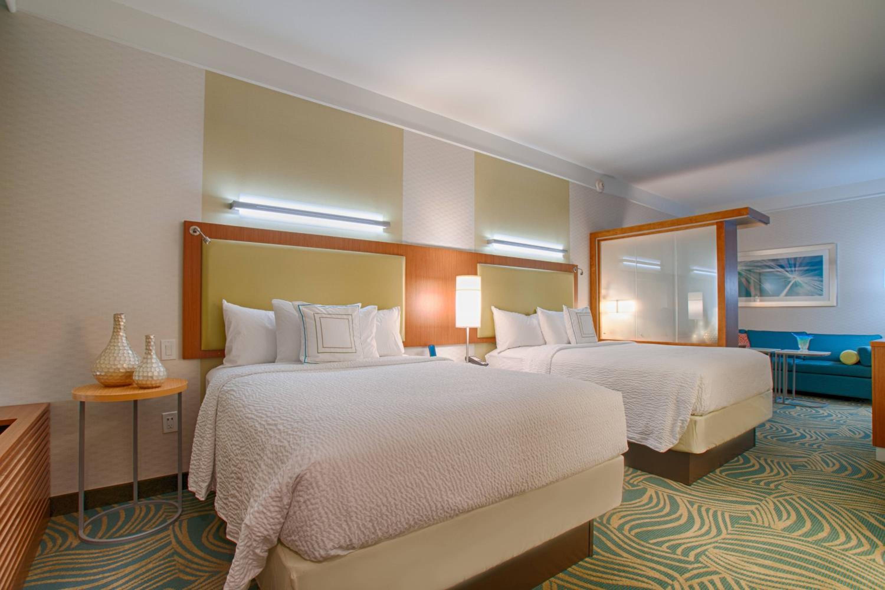 Queen Suite with Two Queen Beds and Trundle Sofa photo 1