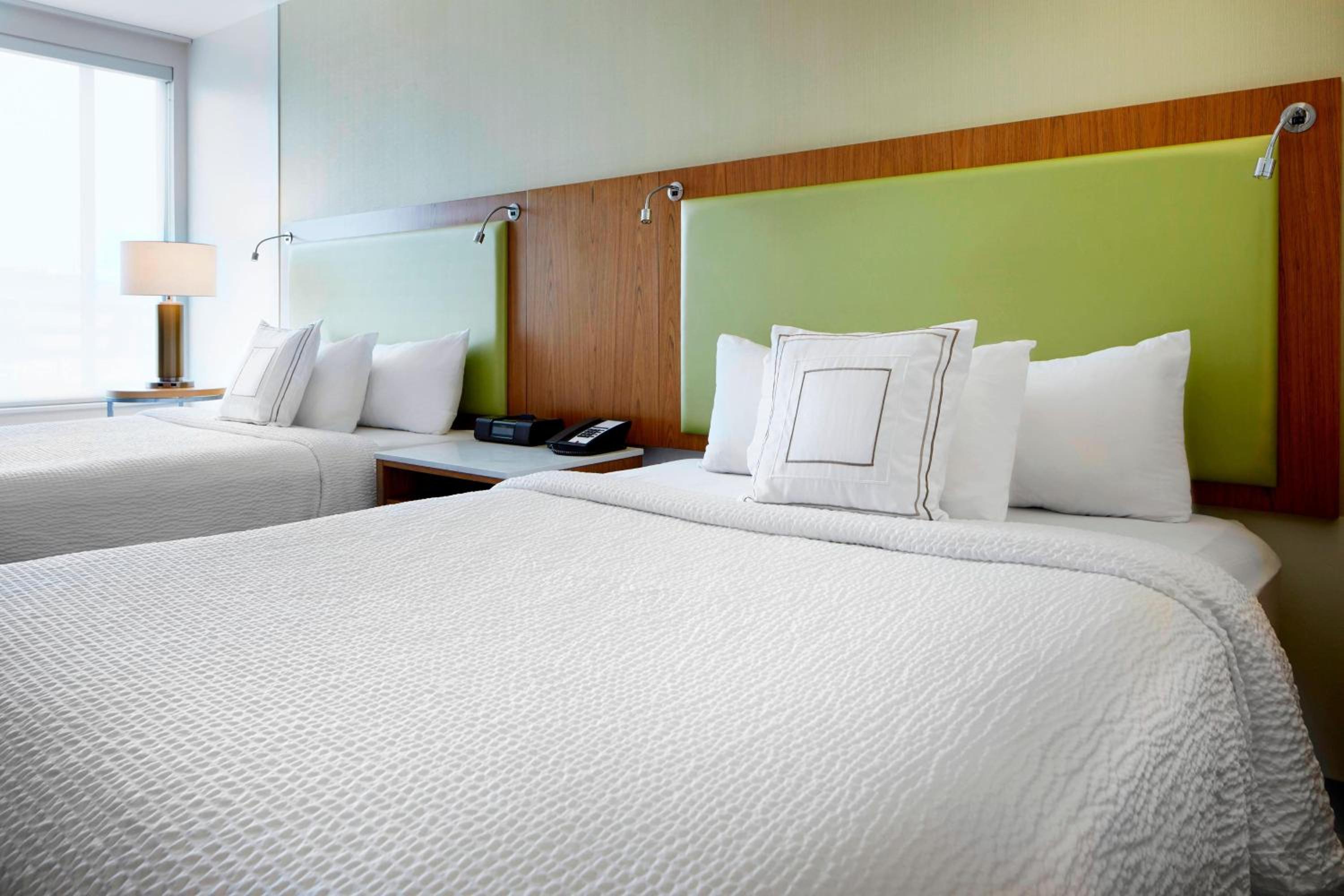 Queen Suite with Two Queen Beds and Trundle Sofa - Photo 2