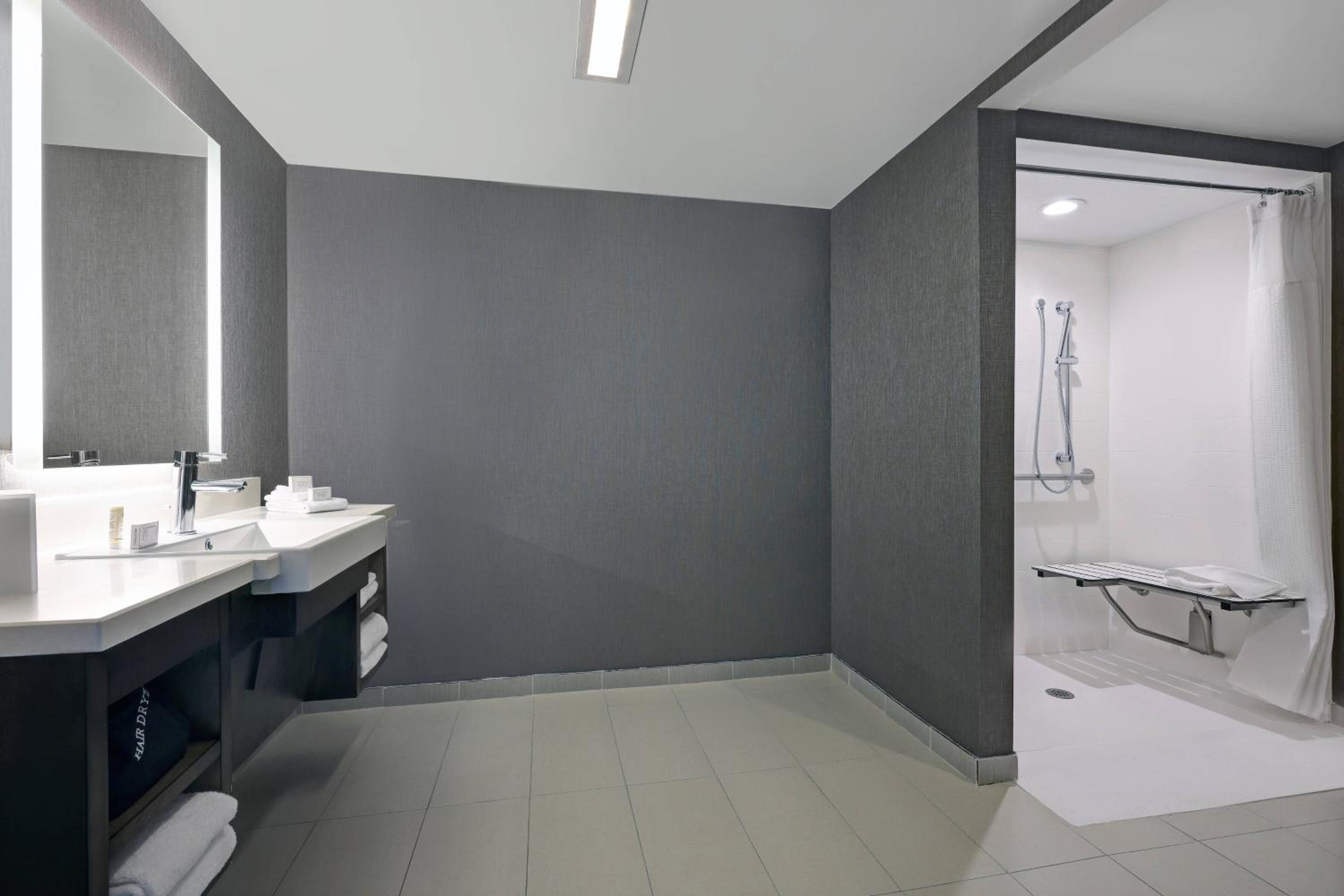 Queen Suite with Sofa Bed and Roll-in Shower - Mobility and Hearing Accessible - Photo 4