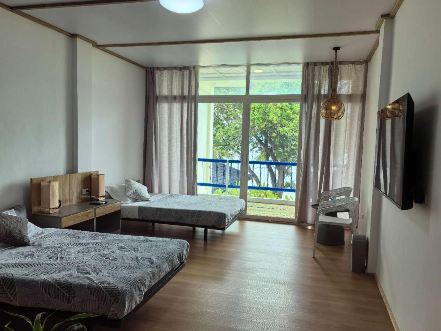 Double or Twin Room with Side Sea View