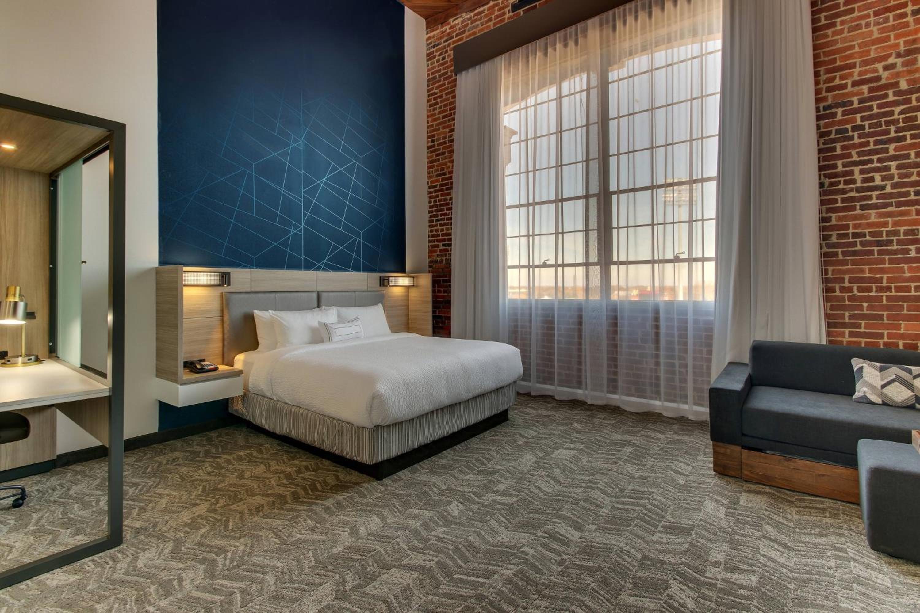King Suite with Stadium View and Sofa Bed - Photo 2