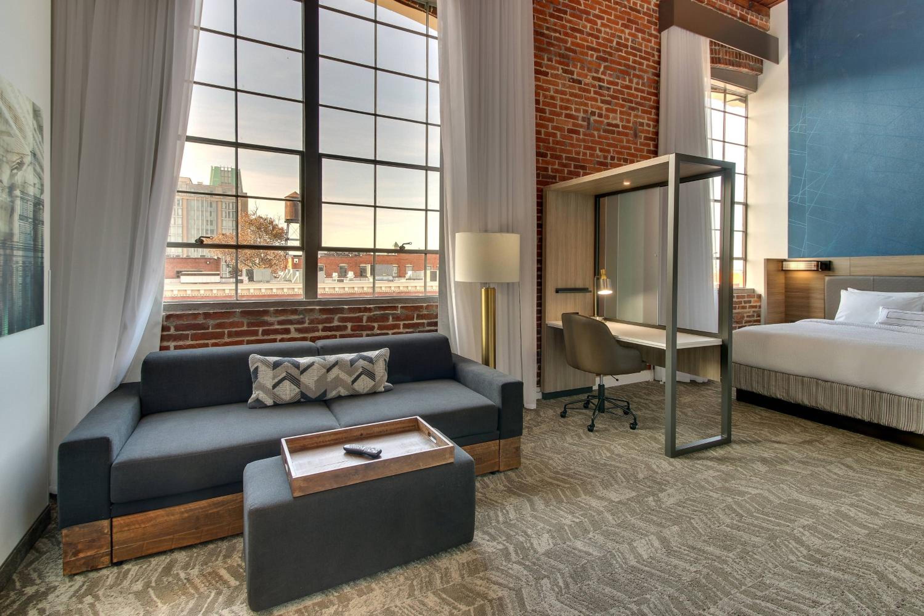 King Suite with Stadium View and Sofa Bed - Photo 1