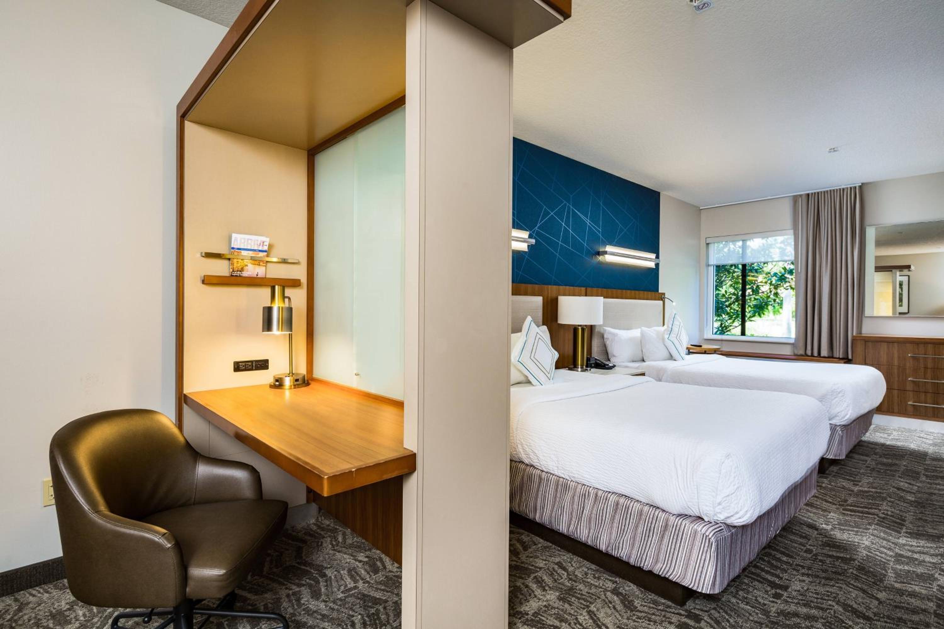 Queen Suite with Two Queen Beds and Trundle Sofa - Photo 2