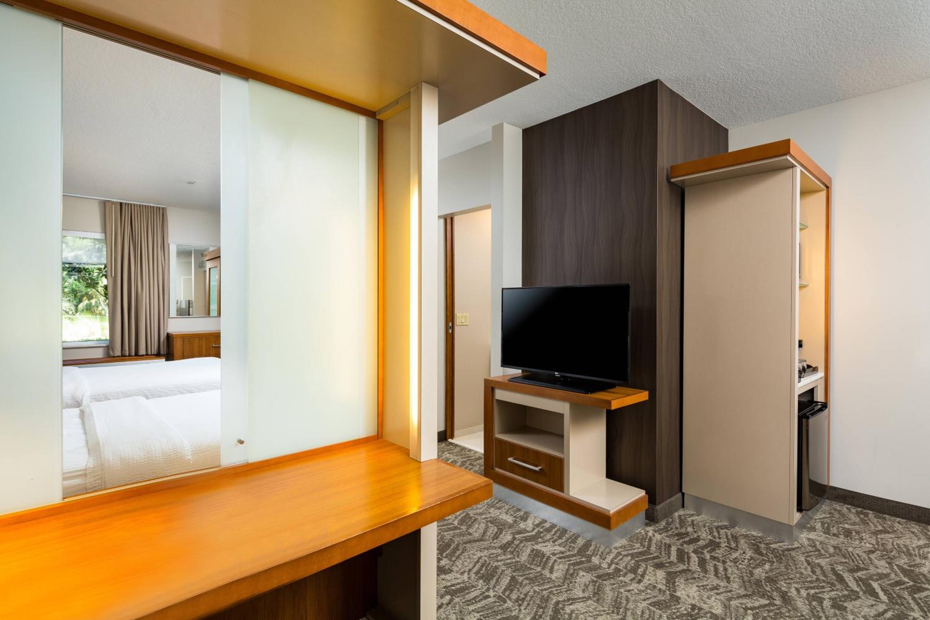 Queen Suite with Two Queen Beds and Trundle Sofa - Photo 9