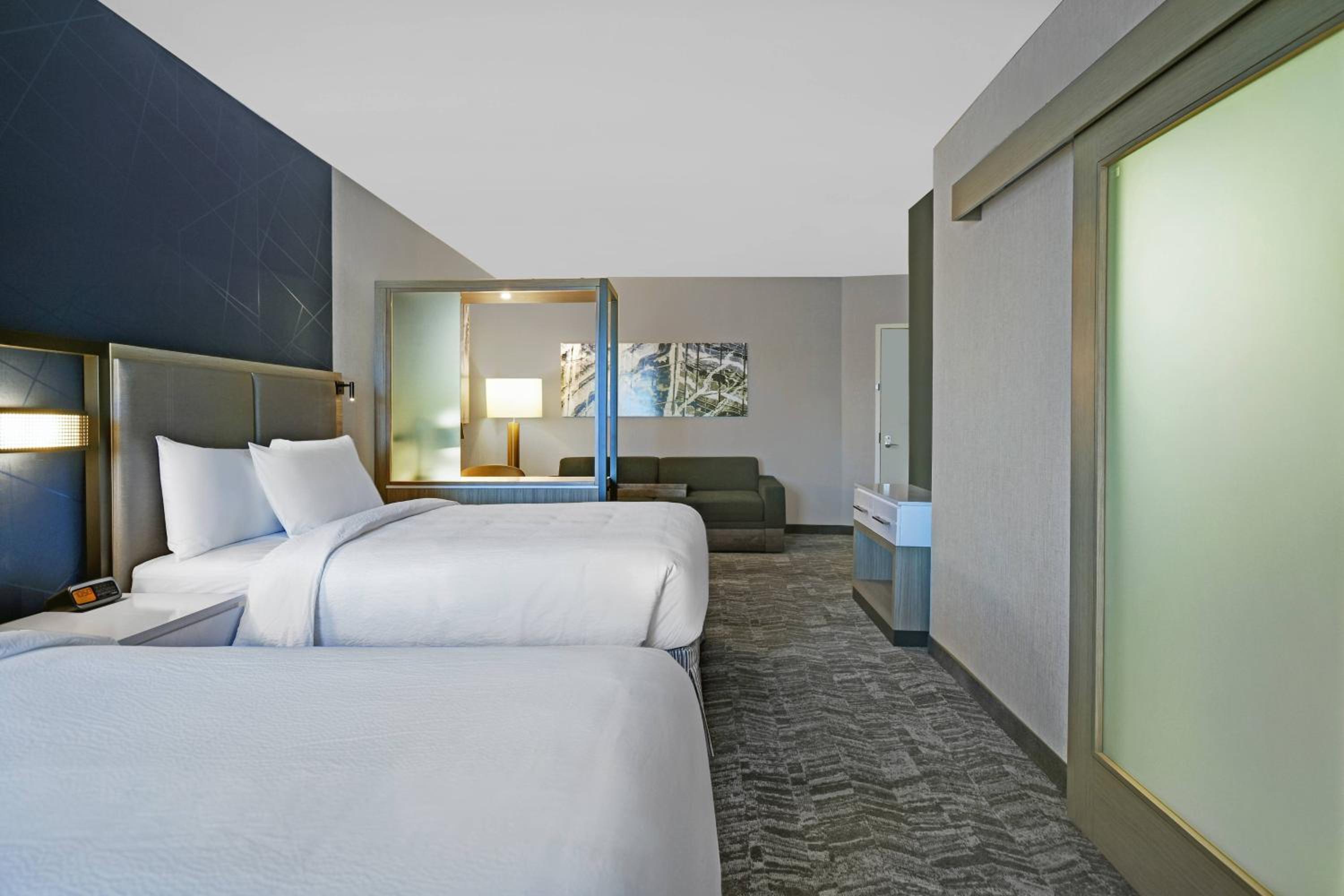 Queen Suite with Two Queen Beds and Trundle Sofa - Photo 2
