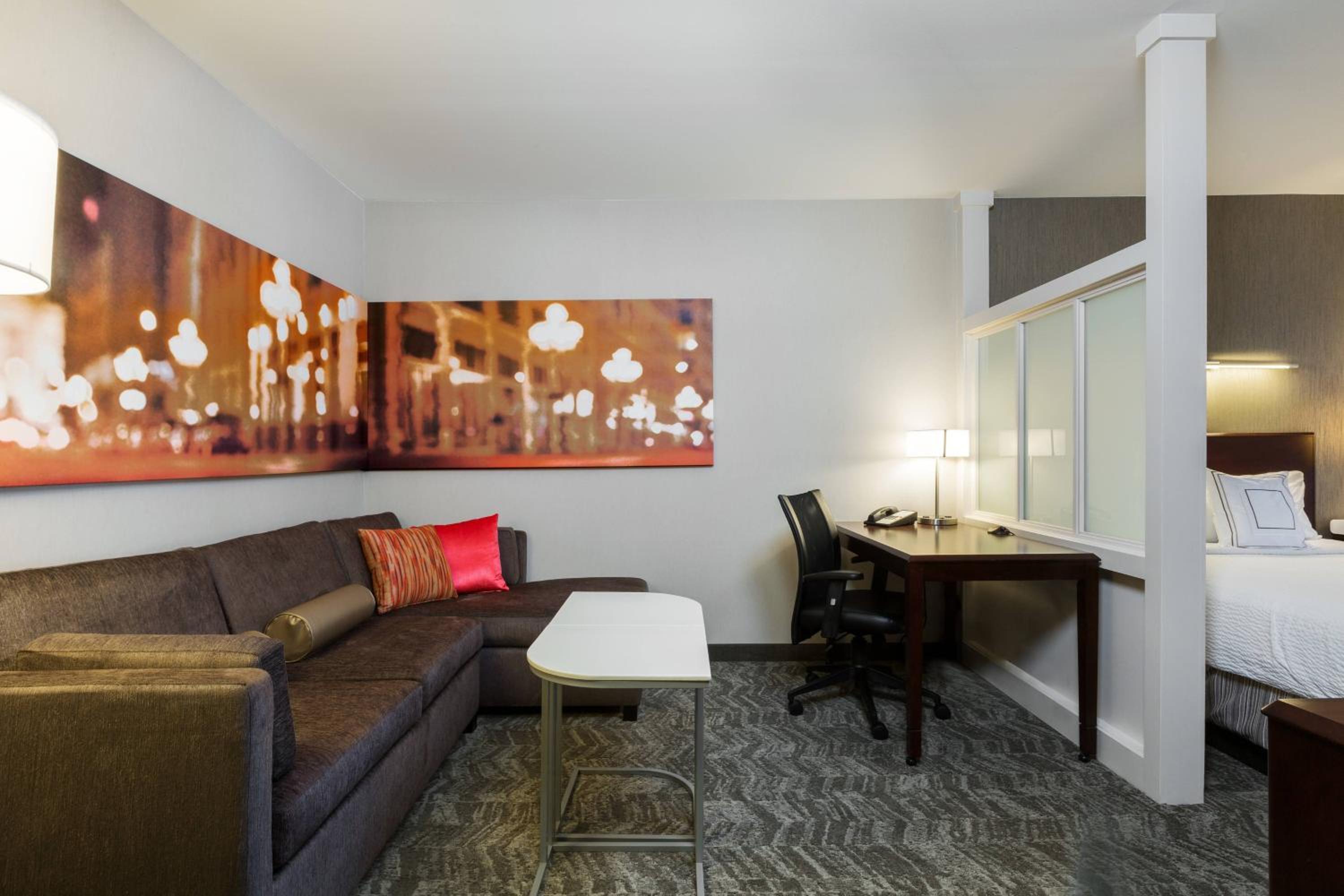 Queen Suite with Two Queen Beds and Sofa Bed - Photo 2