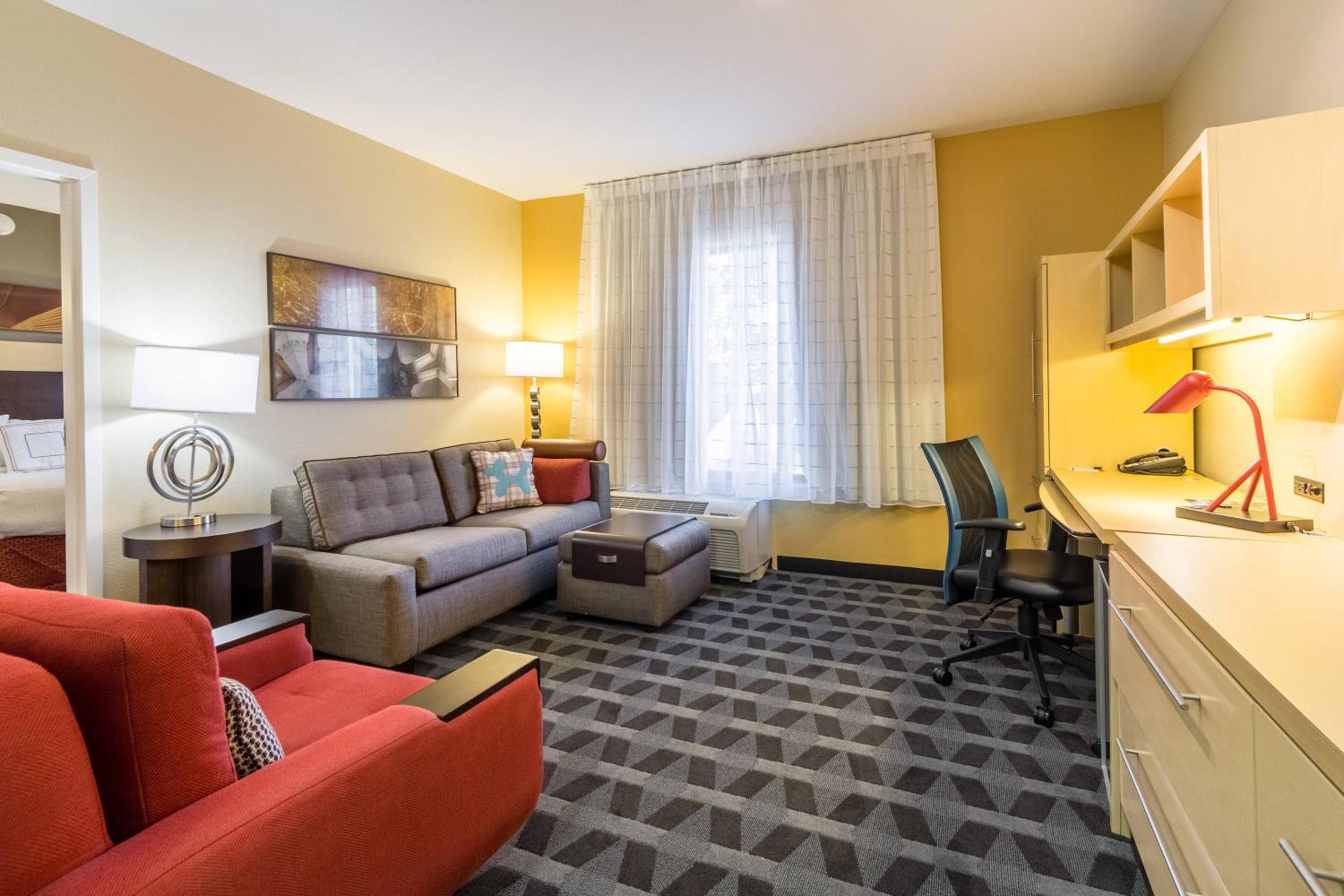 One-Bedroom Queen Suite with Sofa Bed and Adapted Tub - Mobility and Hearing Accessible photo 1