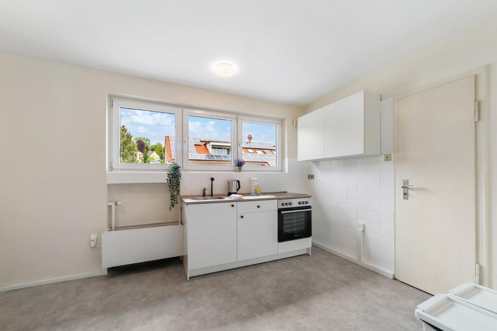 Four-Bedroom Apartment with Balcony  photo 1