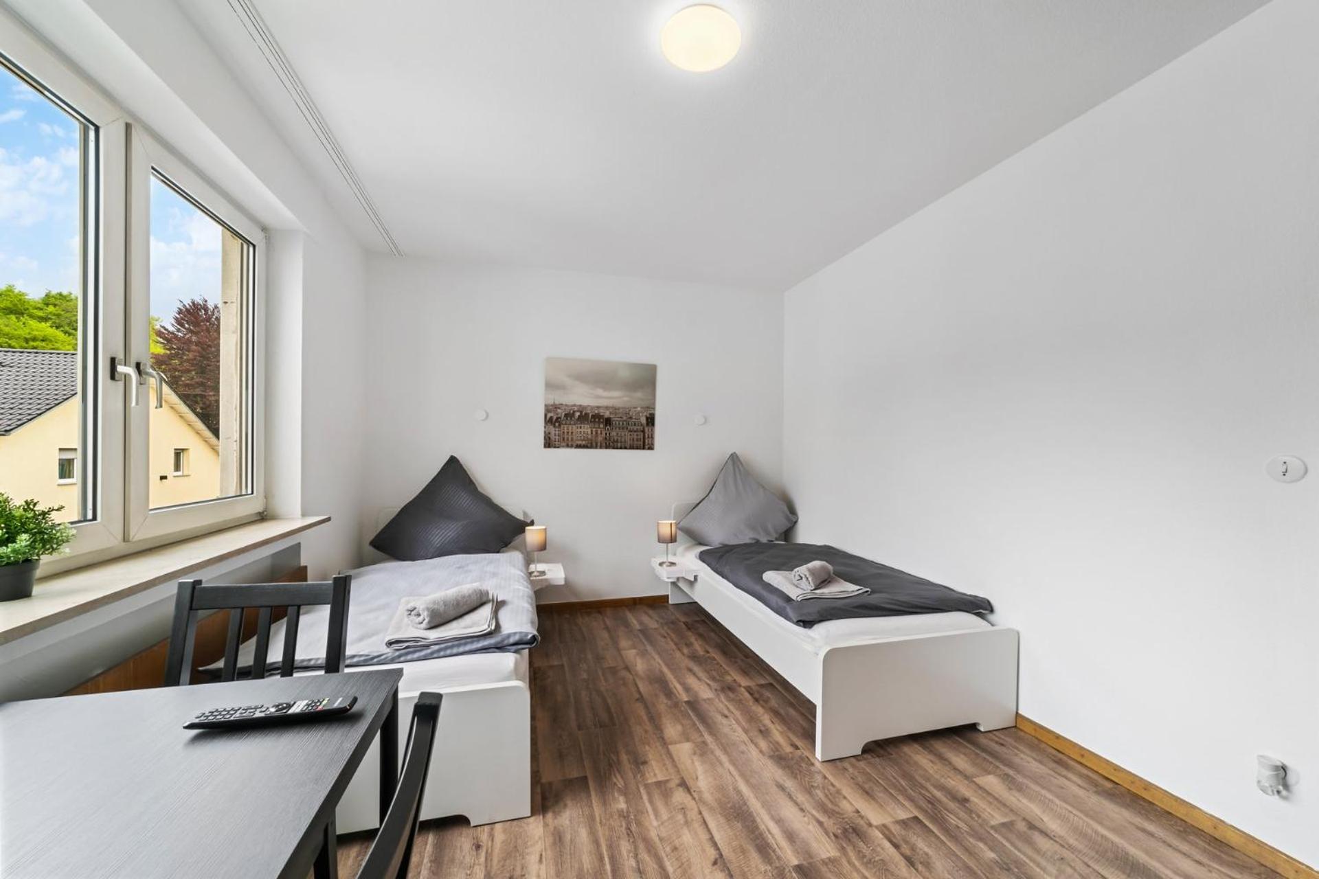 Four-Bedroom Apartment with Balcony
