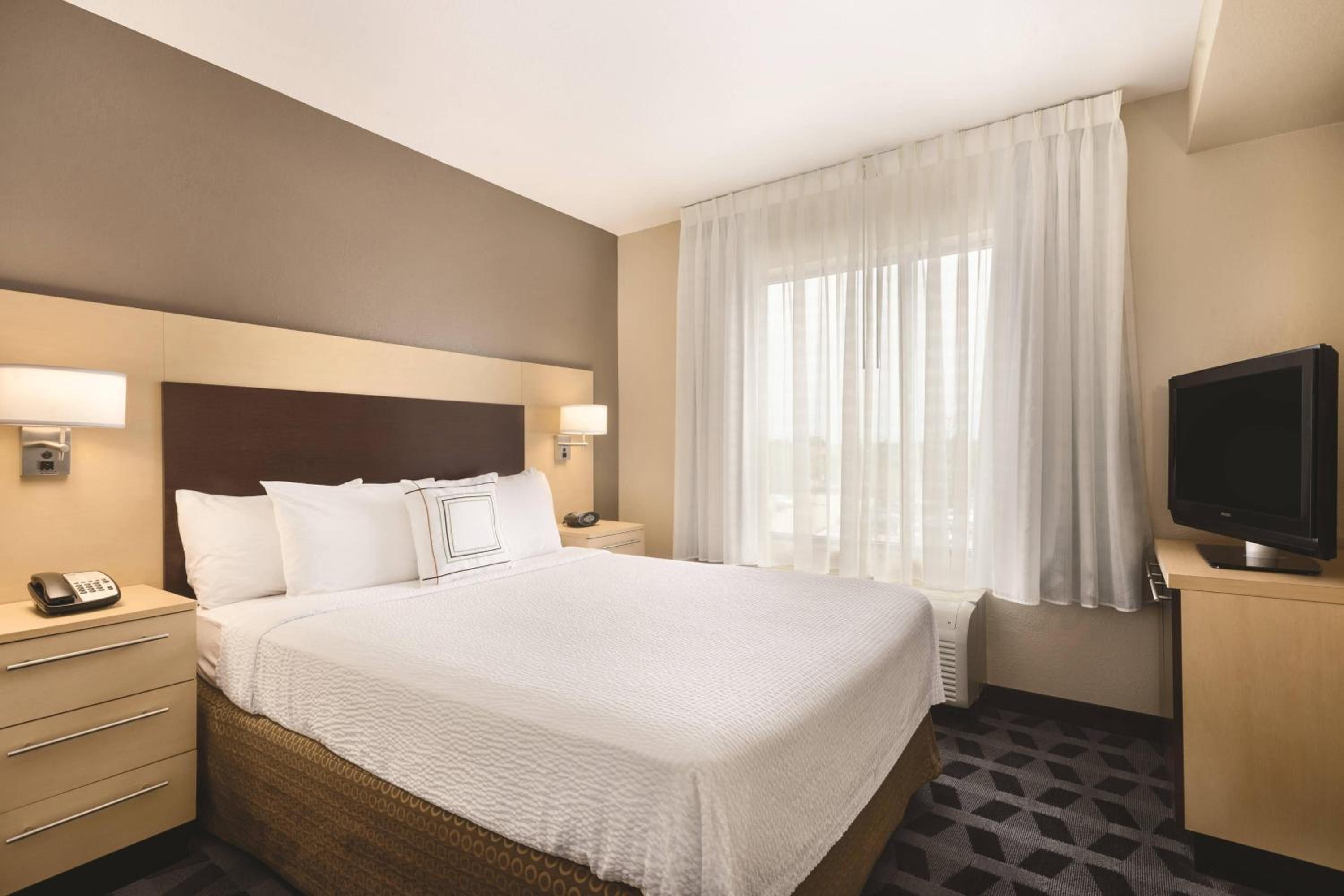 One-Bedroom Queen Suite with Sofa Bed - Mobility and Hearing Accessible with Roll-in Shower