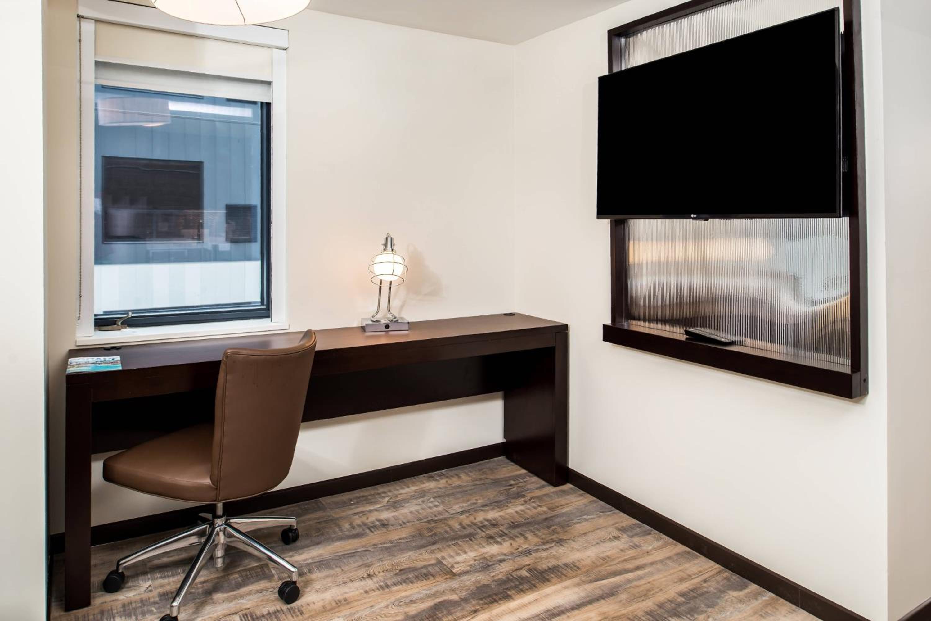 One-Bedroom King Suite with Sofa Bed and Roll-in Shower - Mobility and Hearing Accessible