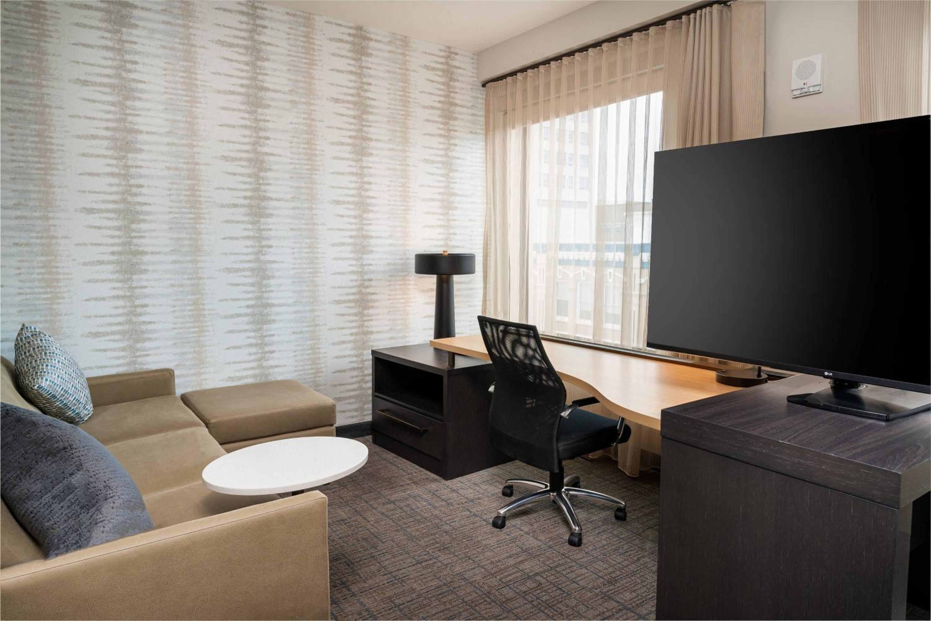 Studio King Suite with Sofa Bed and City View - Mobility/Hearing Accessible with Roll-In Shower