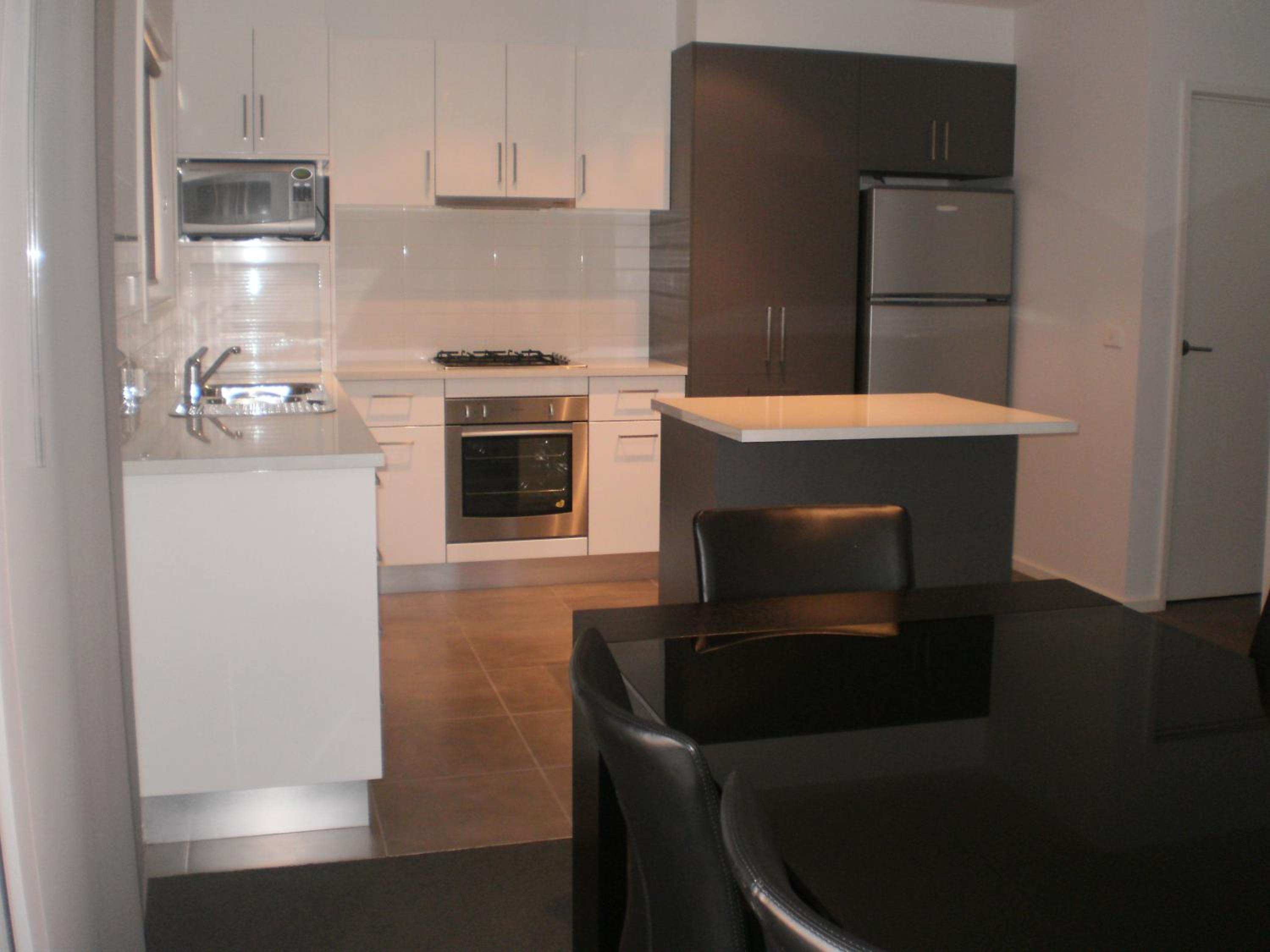 Three-Bedroom Apartment - Photo 4