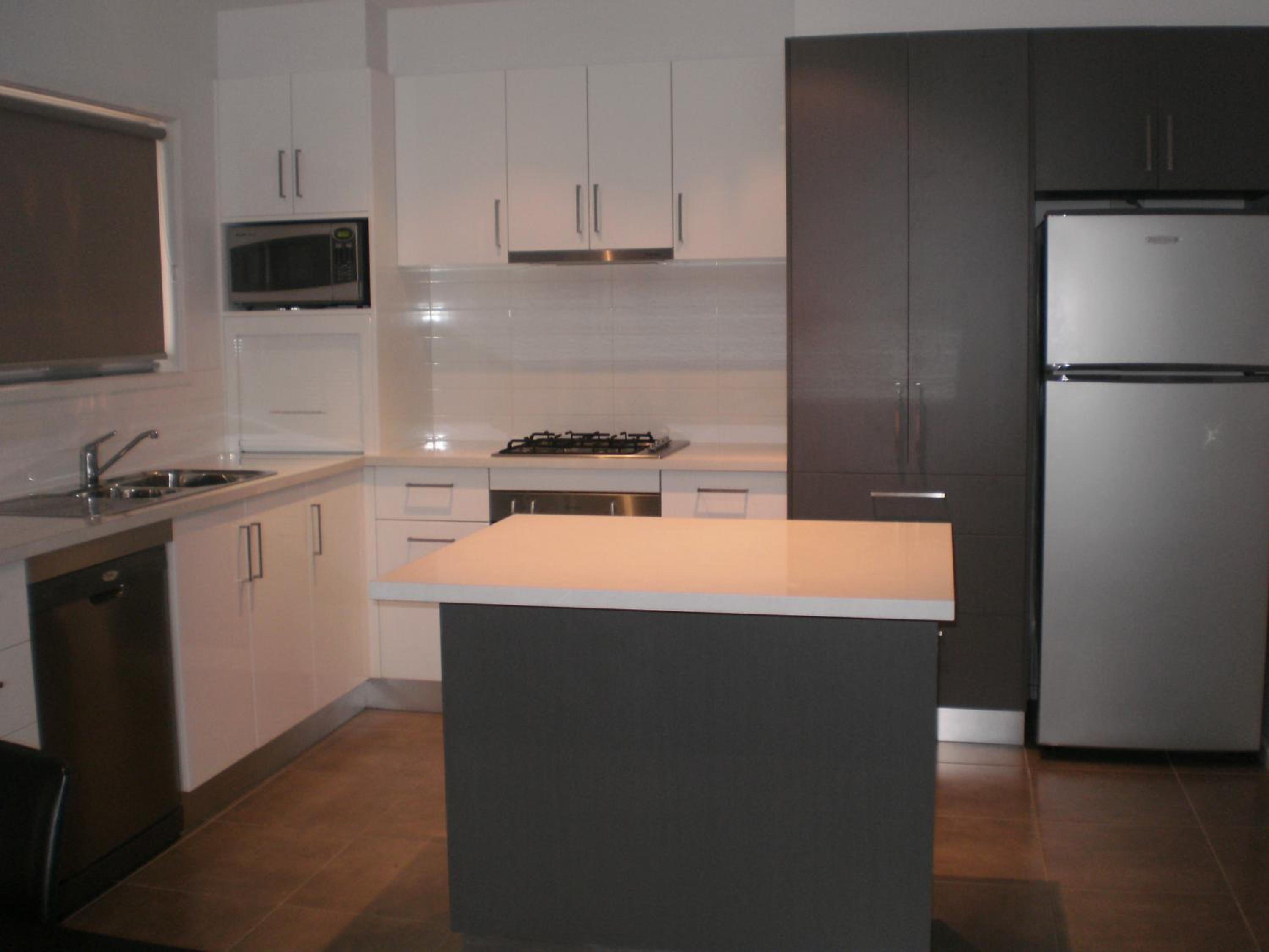 Three-Bedroom Apartment - Photo 5
