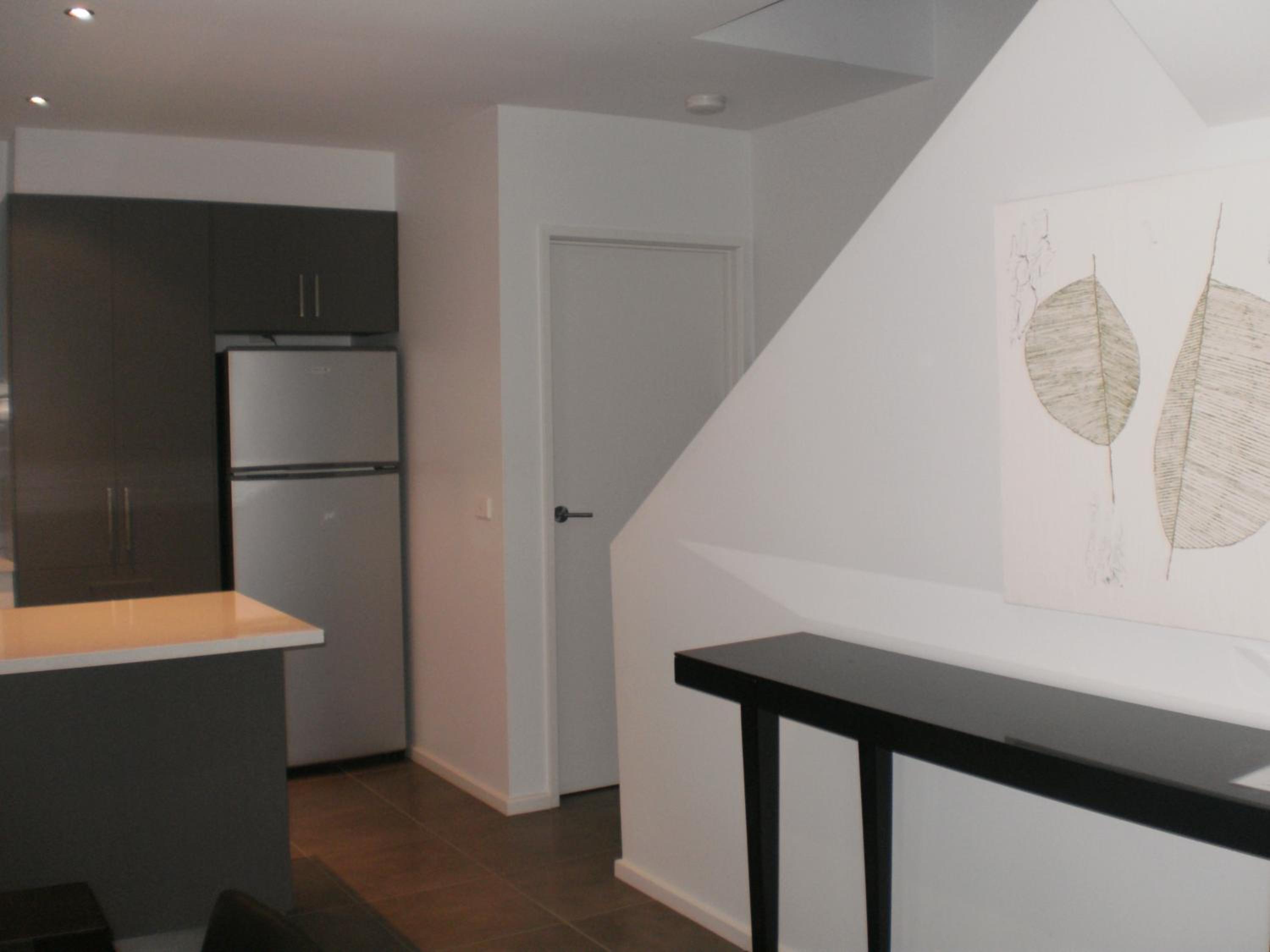 Three-Bedroom Apartment - Photo 2
