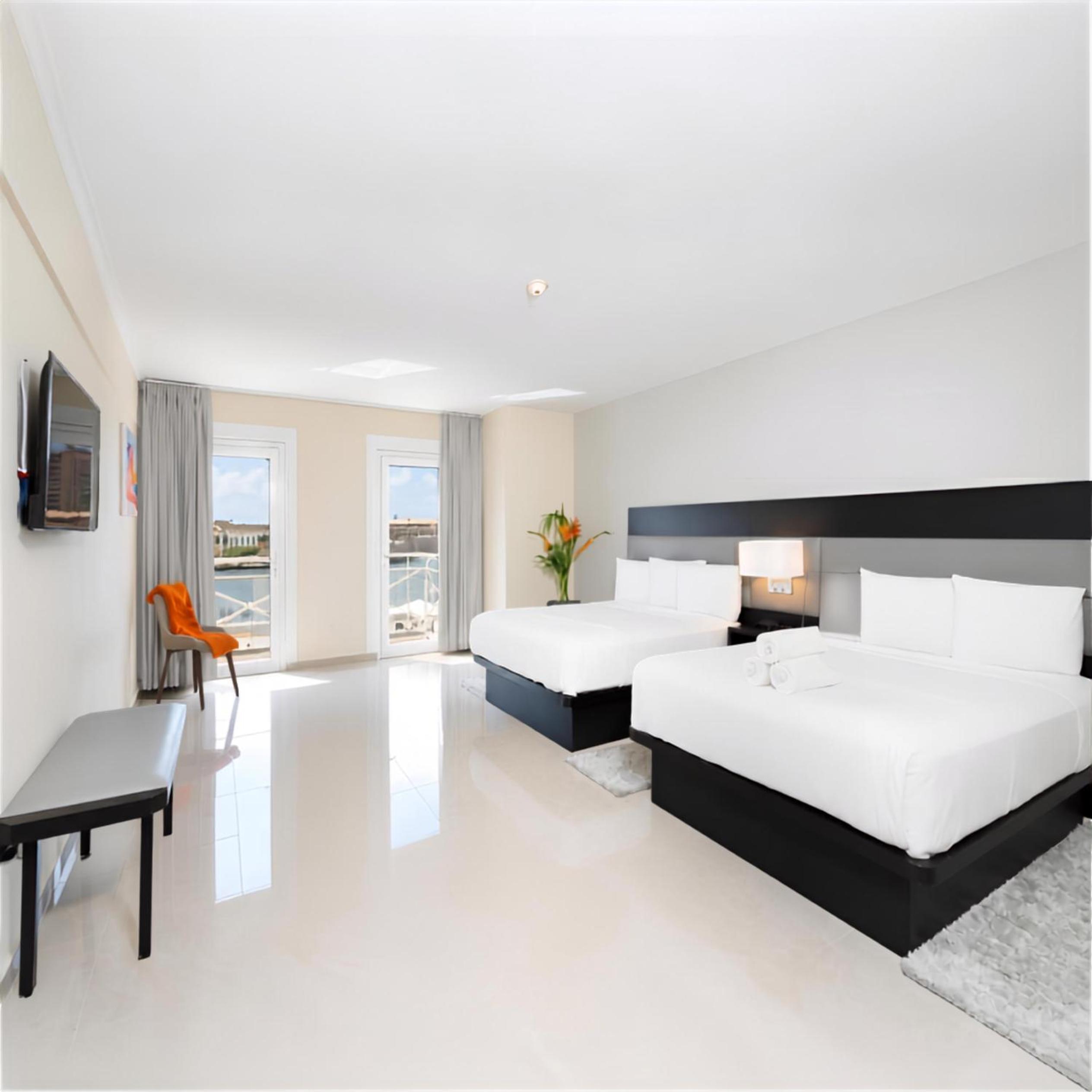 Queen Room with Two Queen Beds and Walk-In Shower - Balcony/Non-Smoking
