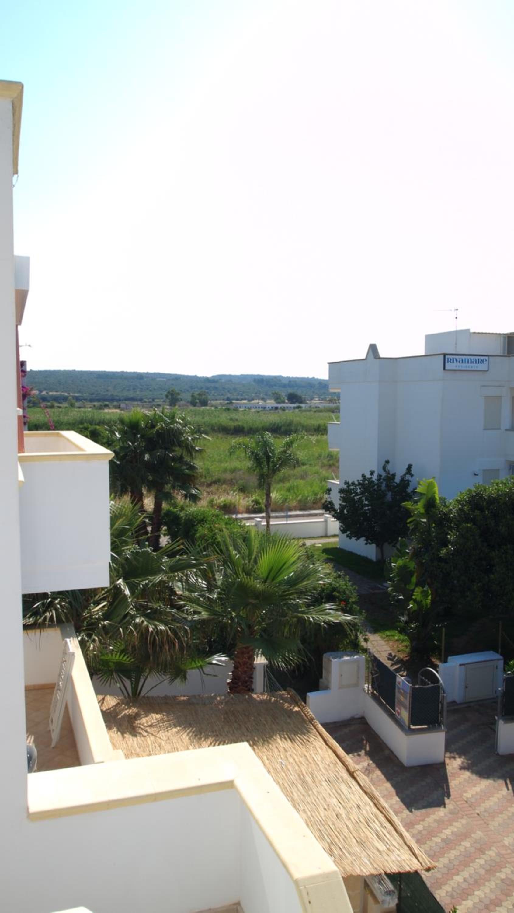 One-Bedroom Apartment with Balcony and Sea View