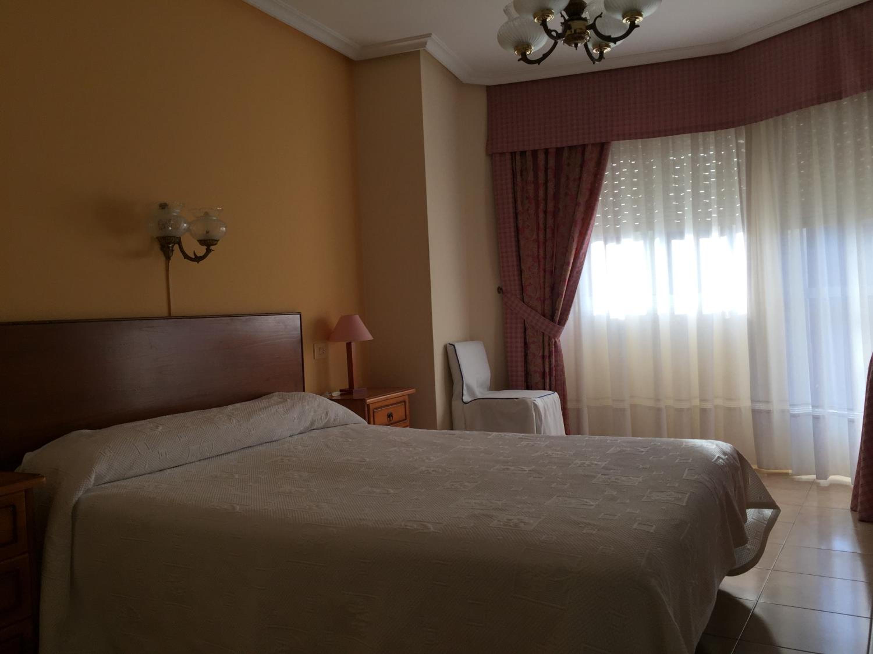 Habitación Estándar con Cama Queen